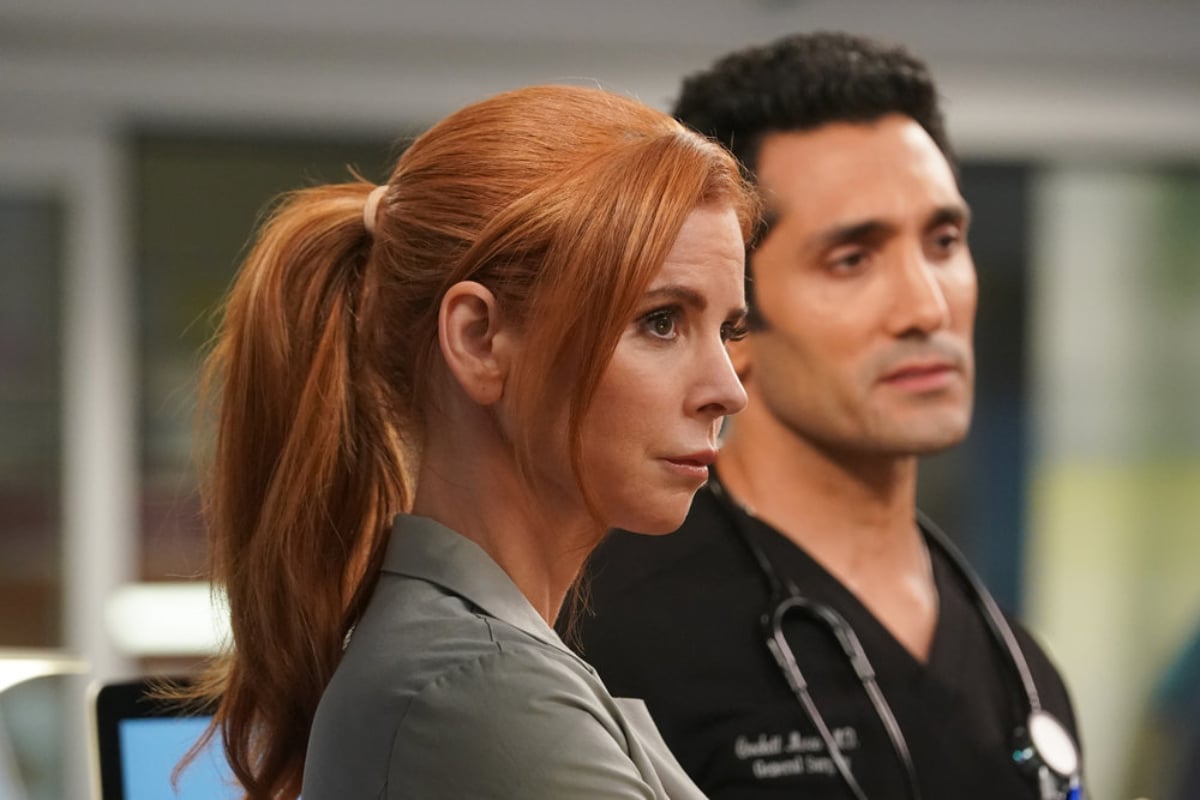 Sarah Rafferty as Dr. Pamela Blake and Dominic Rains as Dr. Crockett Marcel in Chicago Med Season 7. 