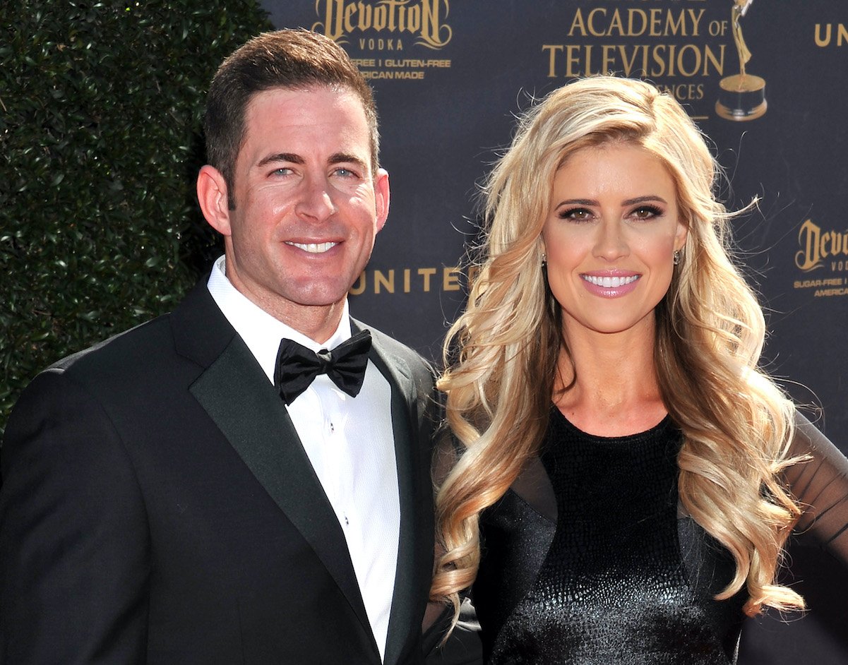 Christina Haack and Tarek El Moussa, both with high net worths, pose together in 2017