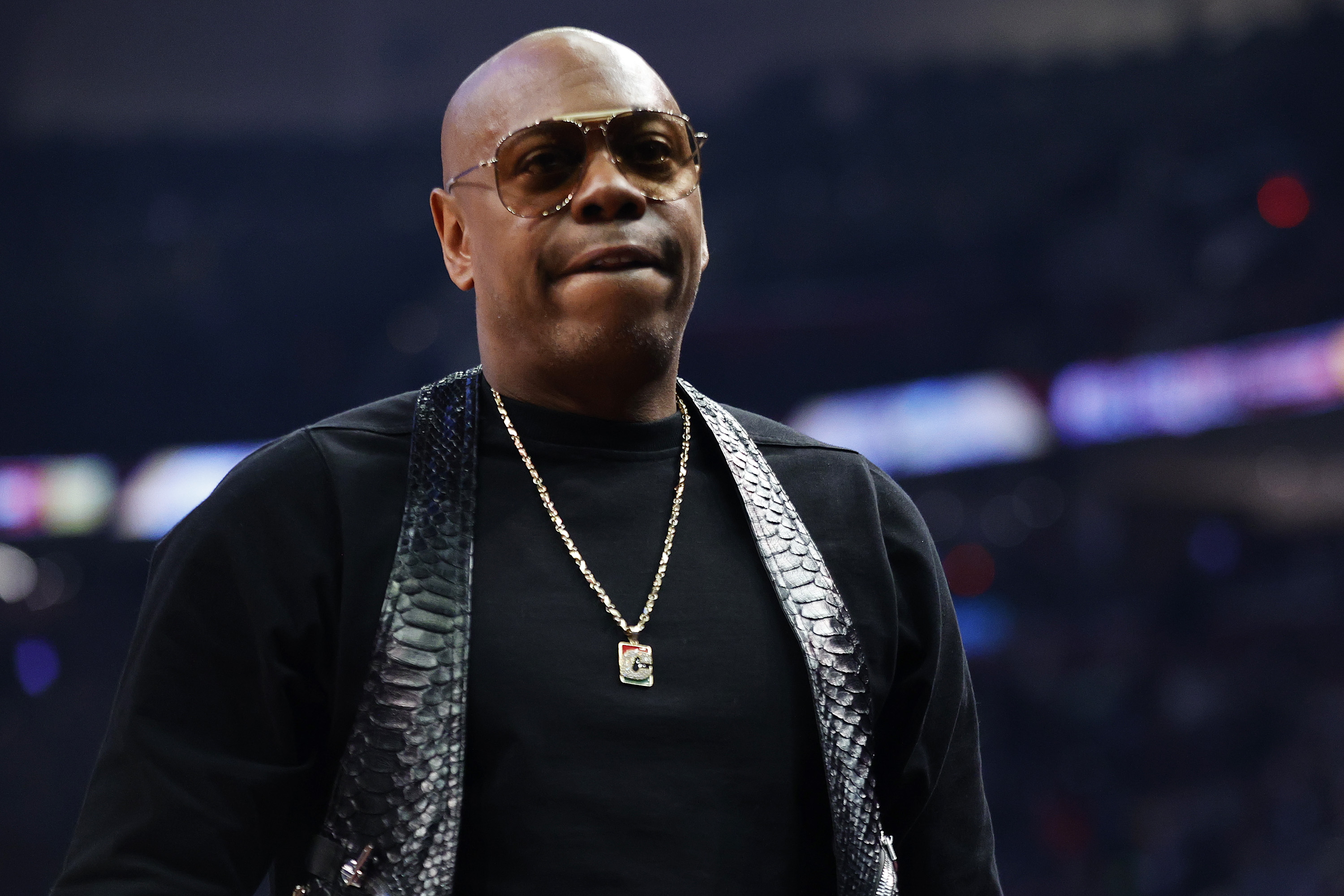 Dave Chappelle, who was attacked onstage in LA, looks on during the 2022 NBA All-Star Game