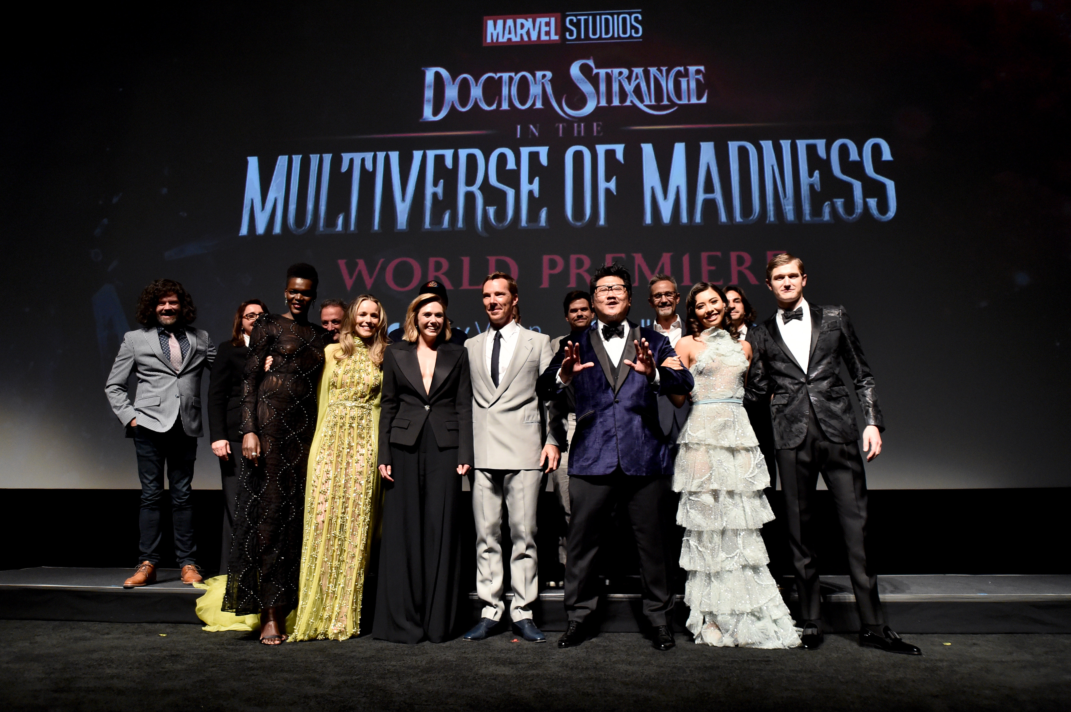 The 'Doctor Strange 2' cast and crew, who were involved in the post-credits scene, stand onstage at the premiere.