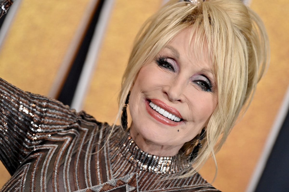 Dolly Parton smiles at an event.