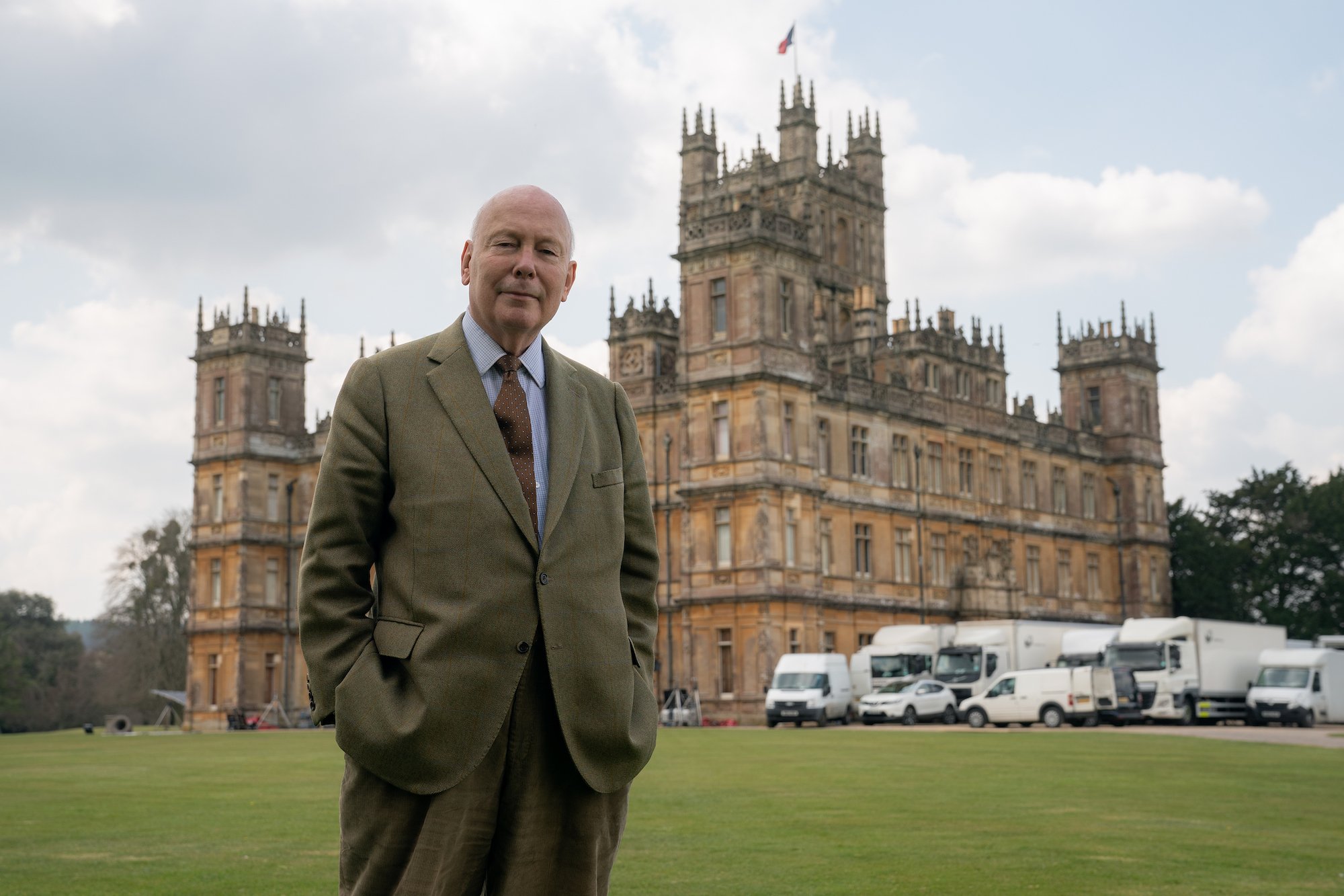 'Downton Abbey' creator Julian Fellowes stands in front of Highclere Castle where he brought his teenage vacation to life