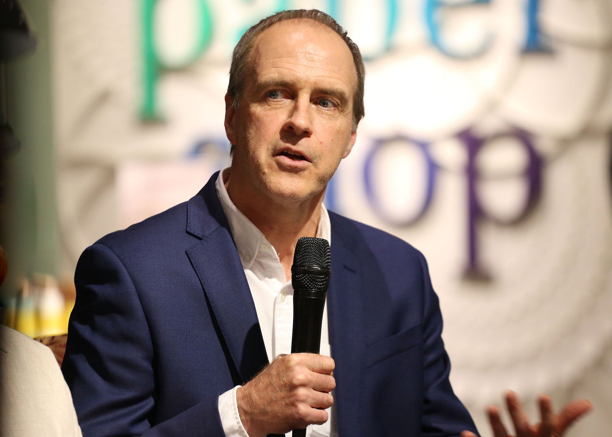 'Downton Abbey': Mr. Molesley actor Kevin Doyle speaks into a microphone, like the school teacher he plays on the show