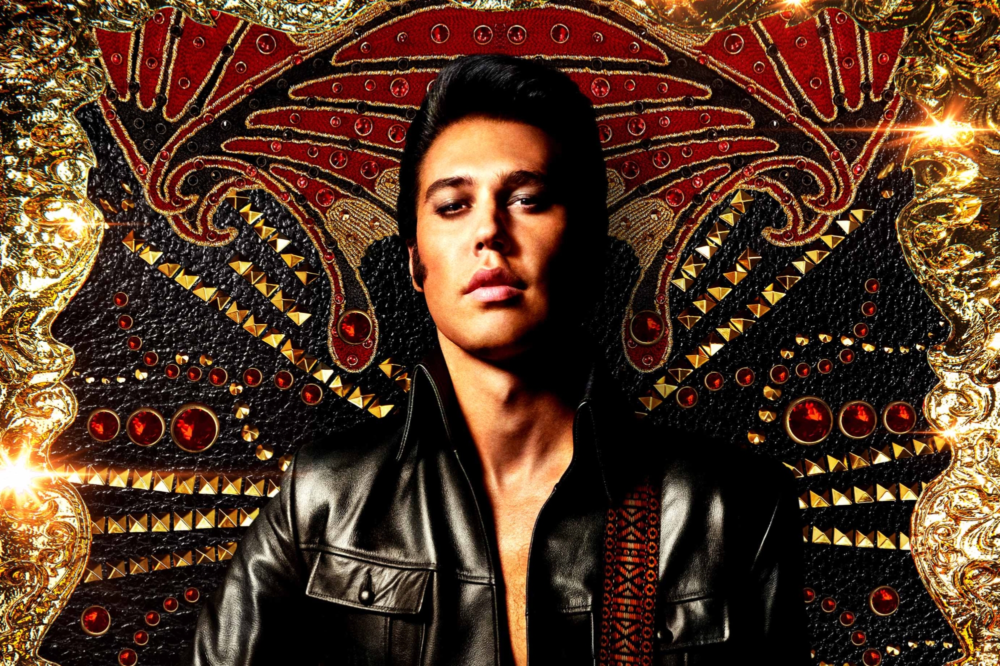 'Elvis' posters with Austin Butler as Elvis Presley with a leather jacket, looking right at the camera.