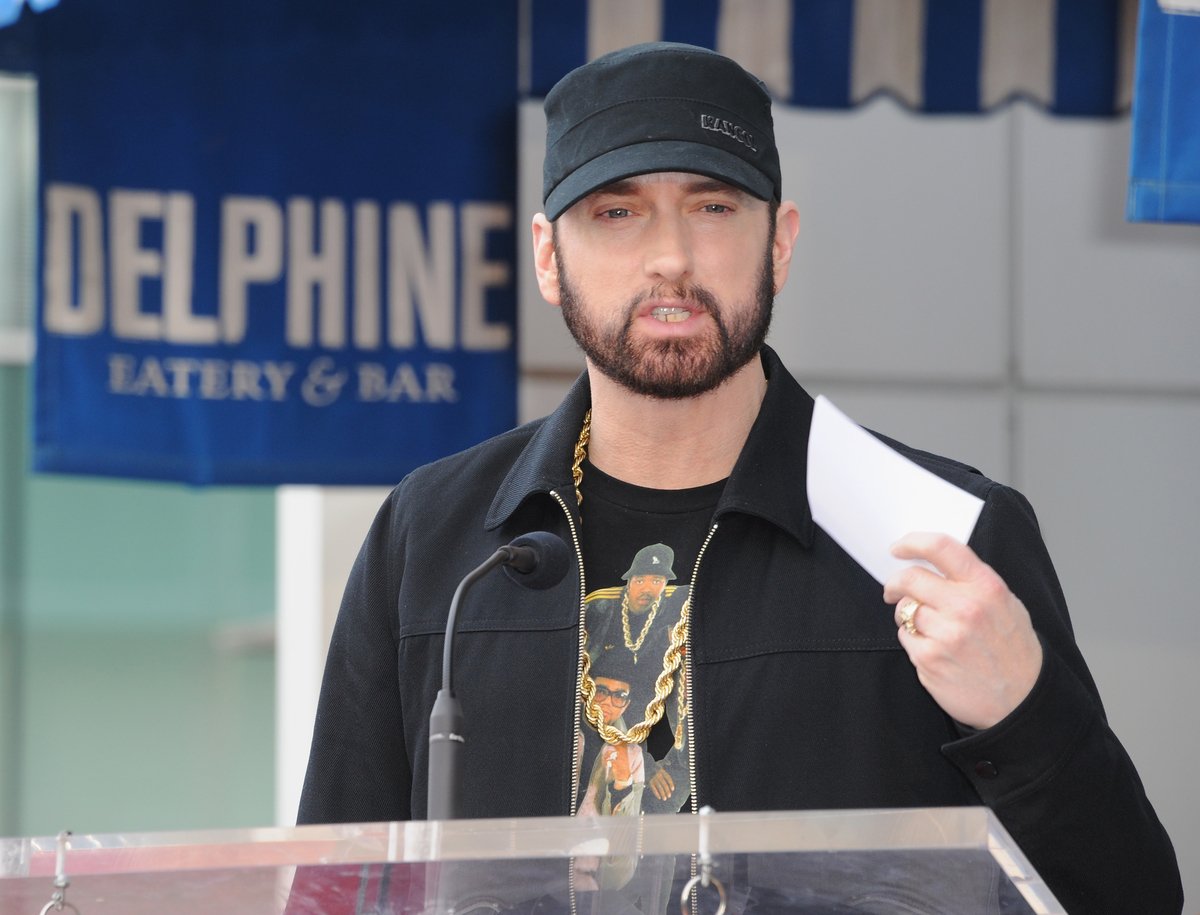 Rock & Roll Hall of Fame inductee Eminem wears a black hat while speaking at an event in Hollywood, CA.