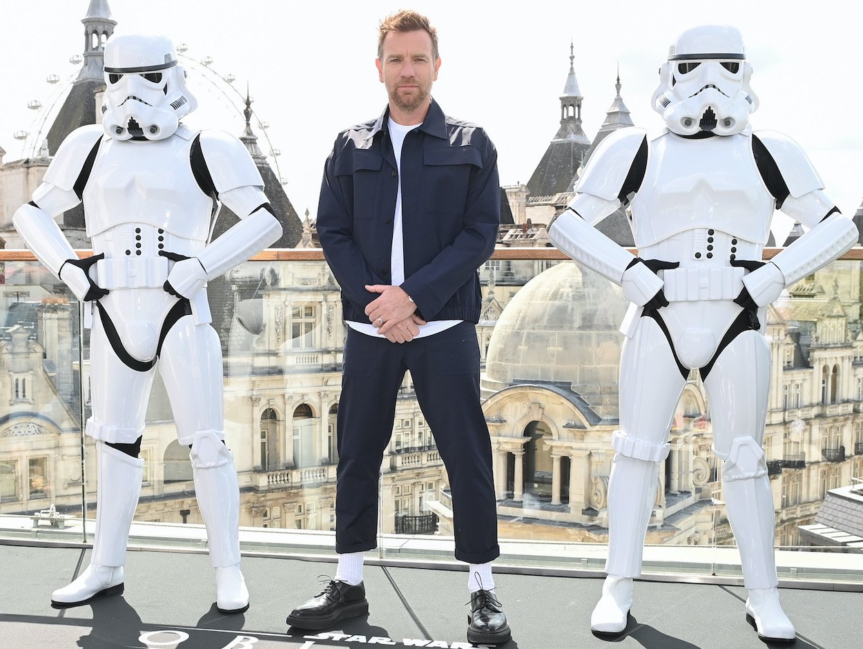 Ewan McGregor poses with stormtroopers as he attends an 'Obi-Wan Kenobi' press event in London in May 2022. McGregor's uncle once told him to not join the 'Star Wars' franchise.