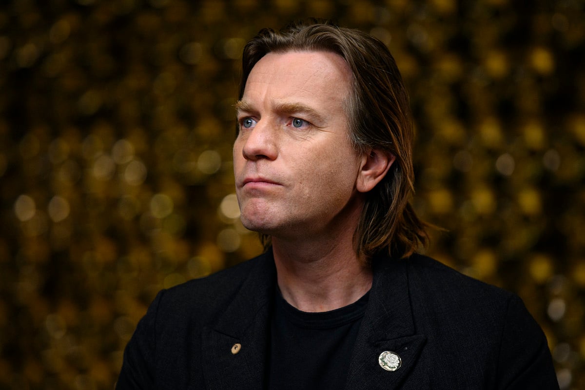 Ewan McGregor frowns dressed in black