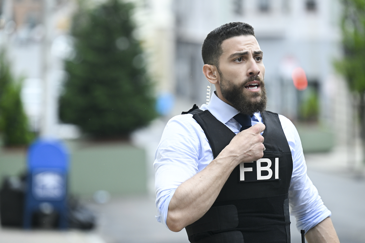 Zeeko Zaki wearing an FBI vest in the 'FBI' Season 4 finale