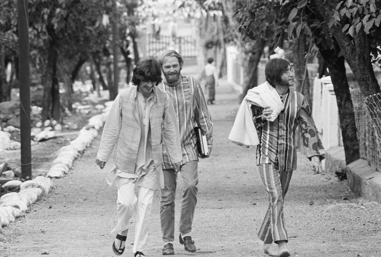 George Harrison, Mike Love, and John Lennon at Maharishi Mahesh Yogi's ashram in India, 1968.