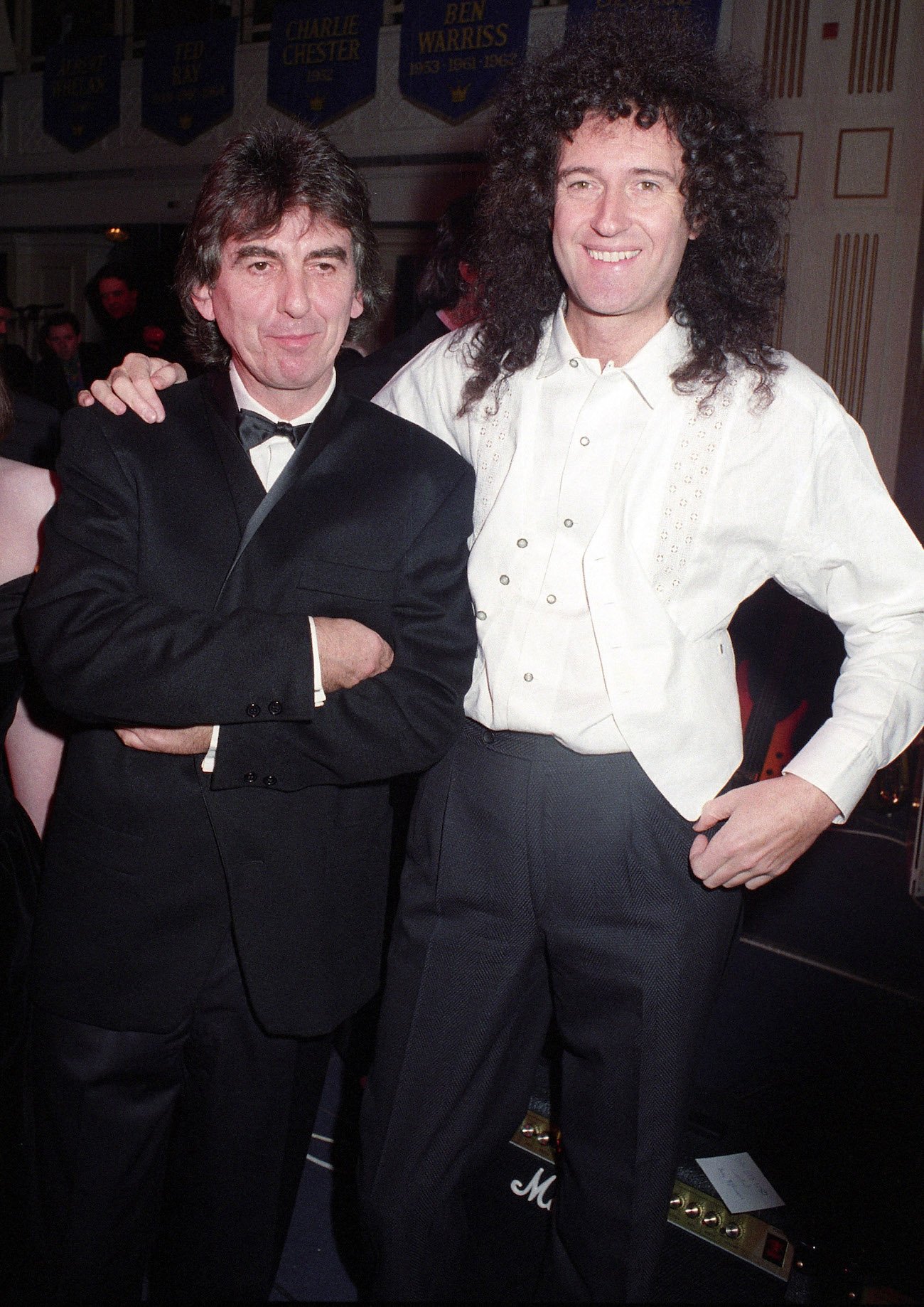 George Harrison and Brian May at the Water Rats Ball in 1992.