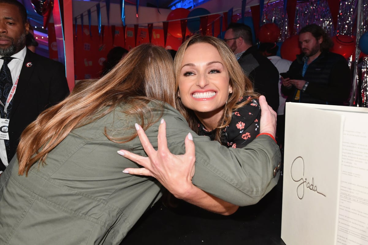 Giada De Laurentiis, right, embraces a fan.