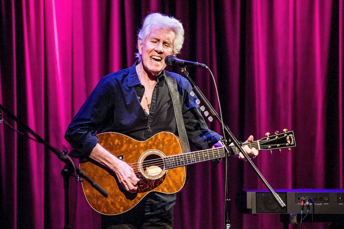 Graham Nash performing on stage