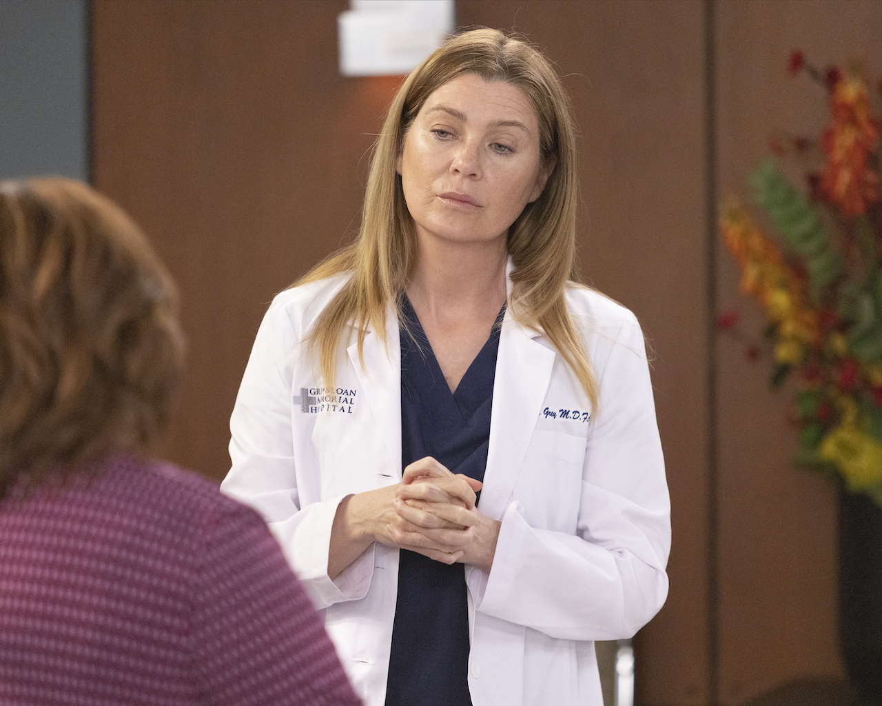 Ellen Pompeo as Meredith Grey and Chandra Wilson as Miranda Bailey look at each other in 'Grey's Anatomy'.