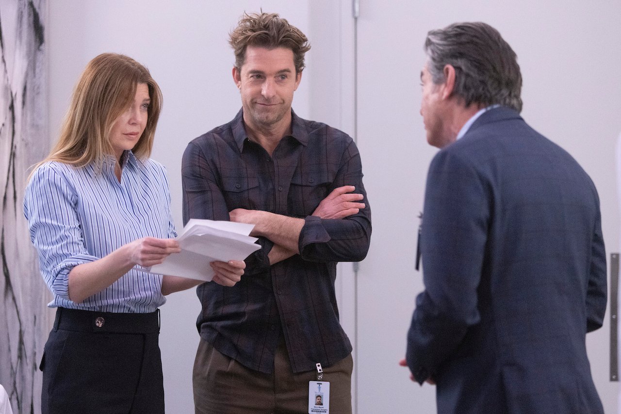 Ellen Pompeo as Meredith Grey, Scott Speedman as Nick Marsh, and Peter Gallagher as David Hamilton talk to each other on 'Grey's Anatomy'.