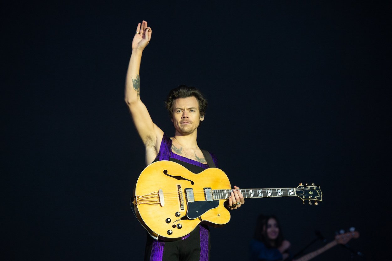 Harry Styles performs in Coventry, England, in May 2022. Styles will donate $1 million from his 2022 North American tour to charity, and it won't be the first time he gives away his money.