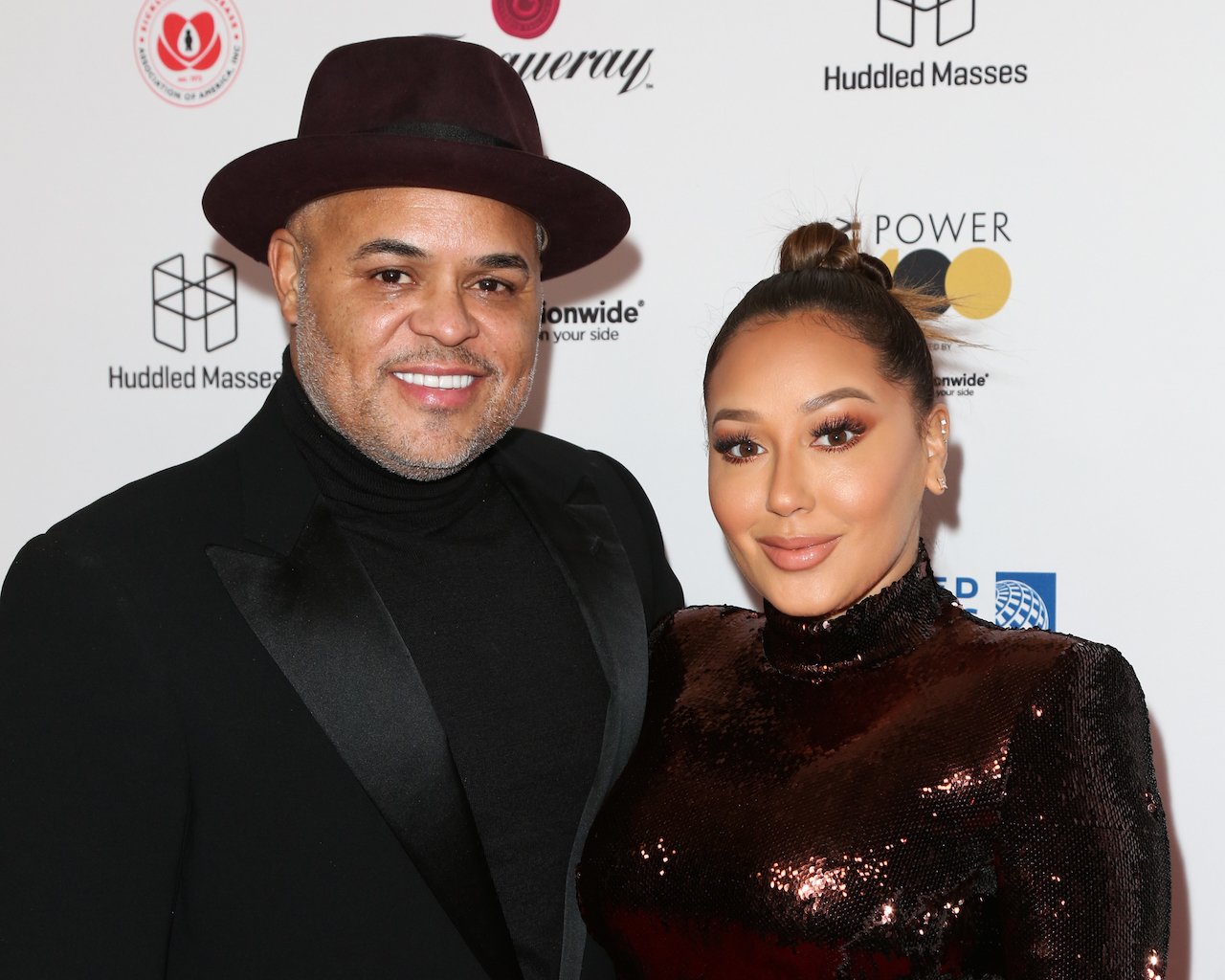 Israel Houghton and Adrienne Bailon pose for photo; Bailon and Houghton's pregnancy journey hasn't been easy