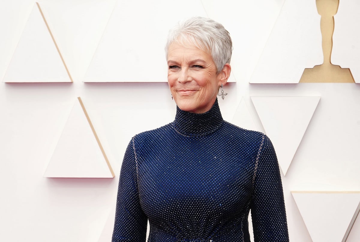 Jamie Lee Curtis smiling while wearing a black dress.