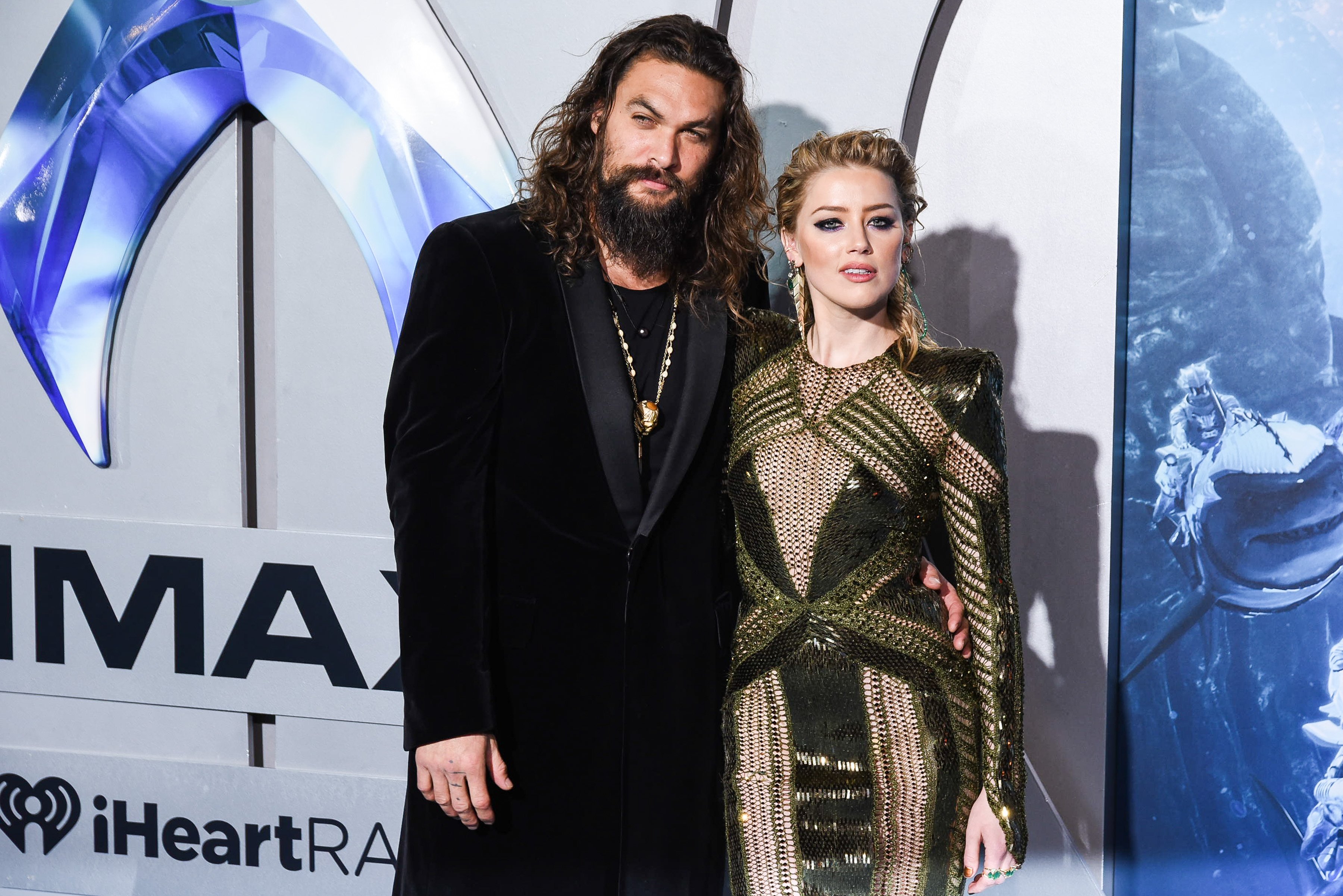 Jason Momoa and Amber Heard attend the premiere of Aquaman