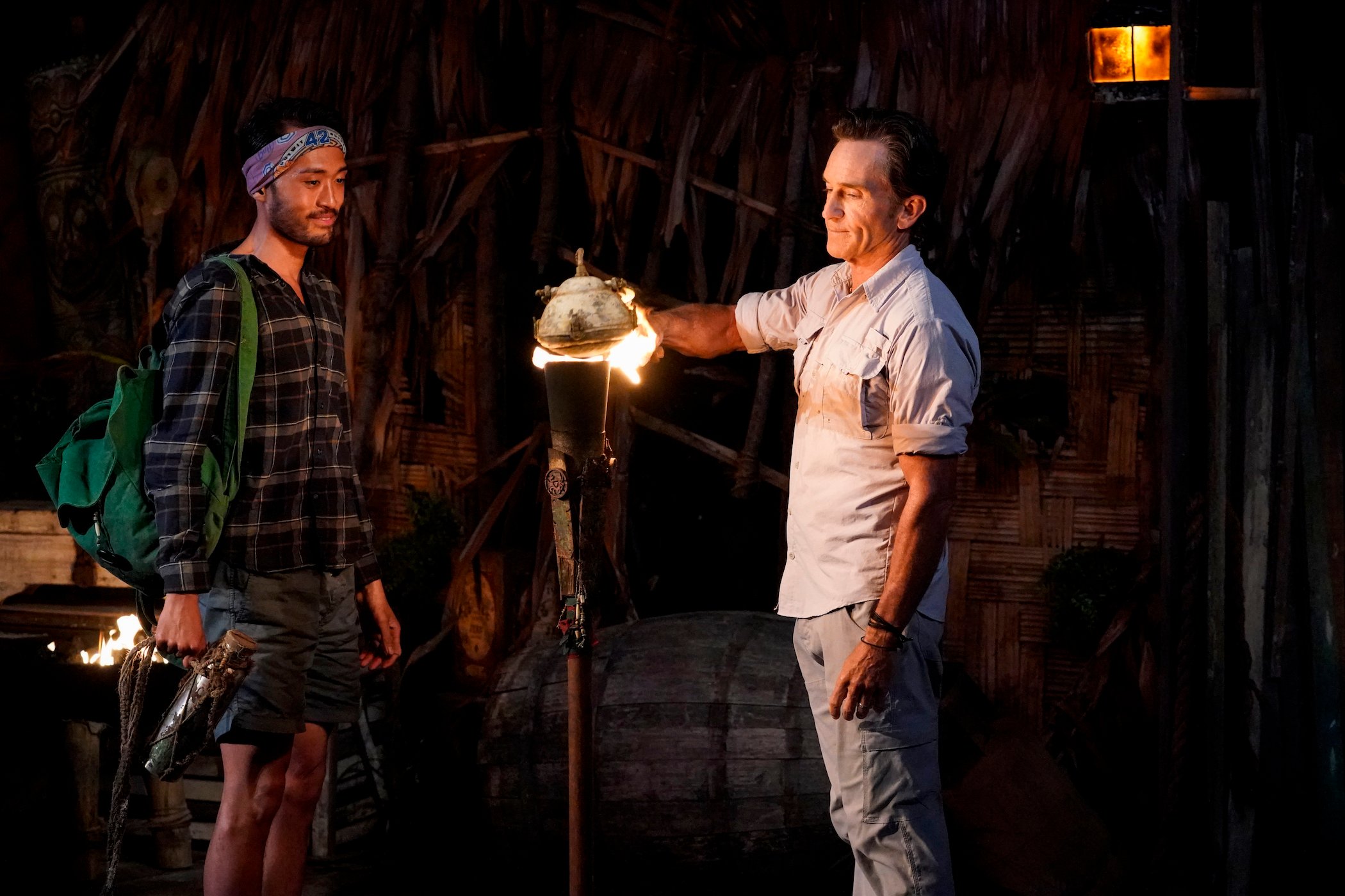 Jeff Probst extinguishing Hai's torch in 'Survivor' Season 42