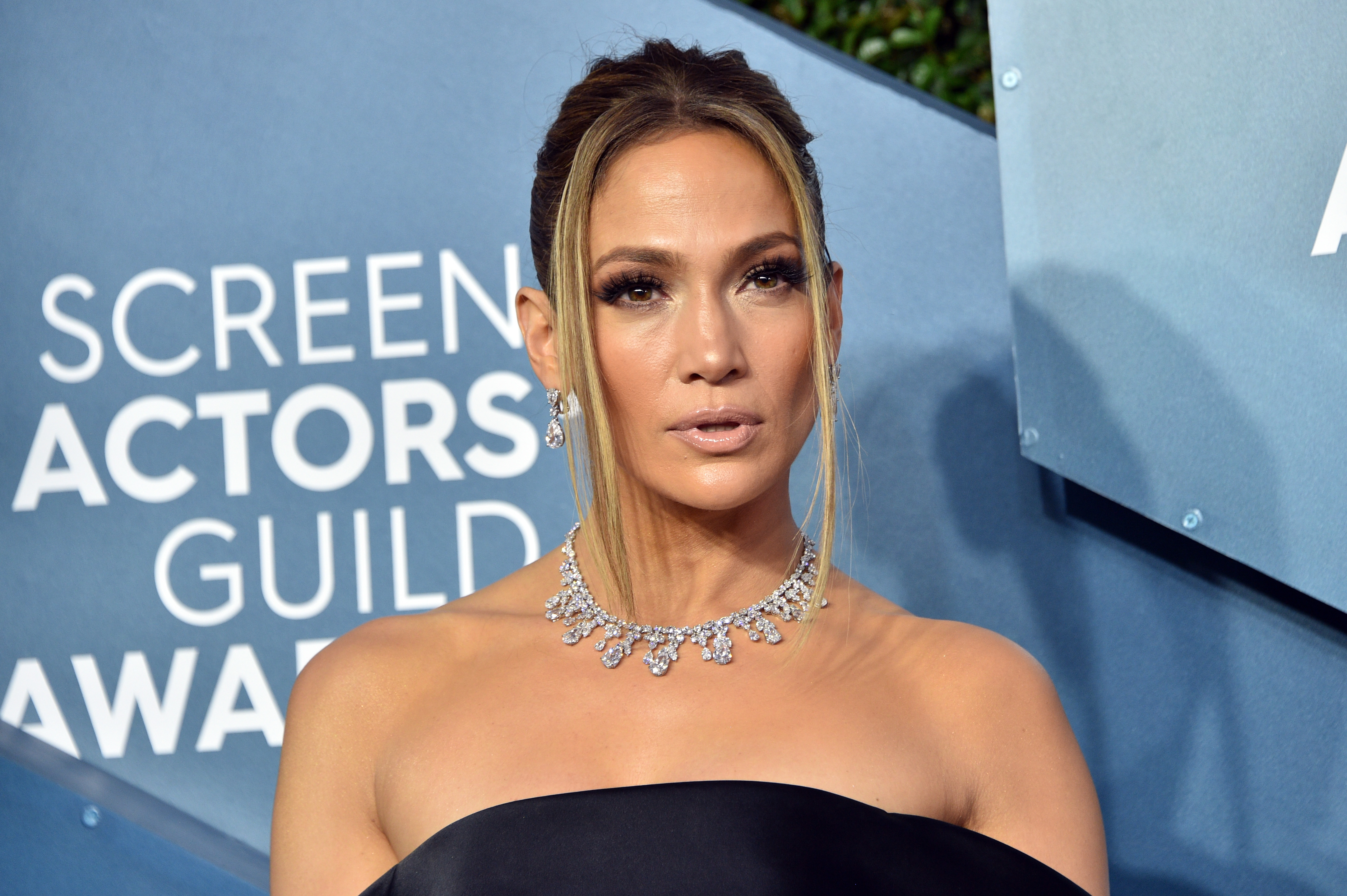 Jennifer Lopez poses on the red carpet.