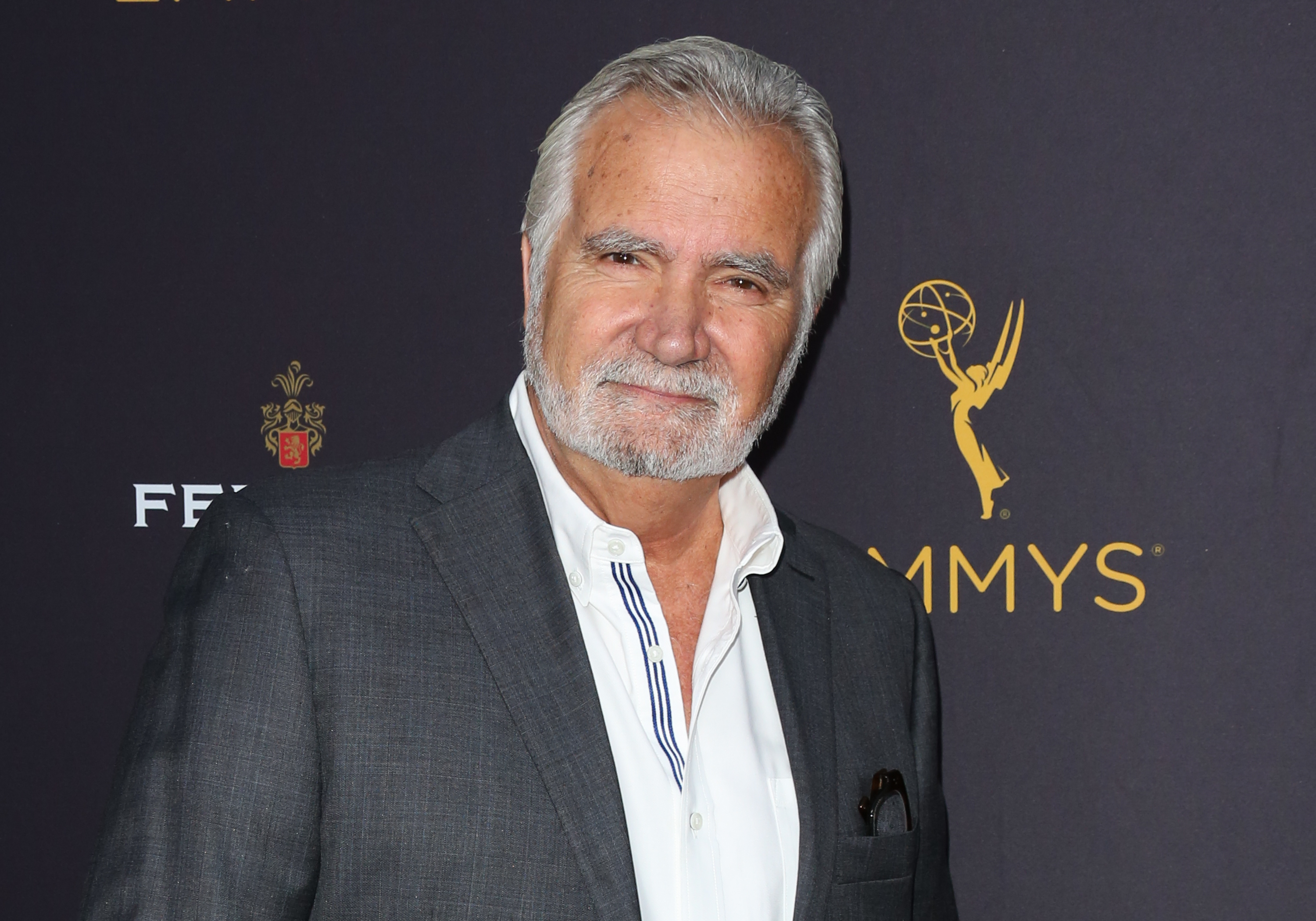 'The Bold and the Beautiful' star John McCook wearing a grey suit and white shirt during the Daytime Emmys.