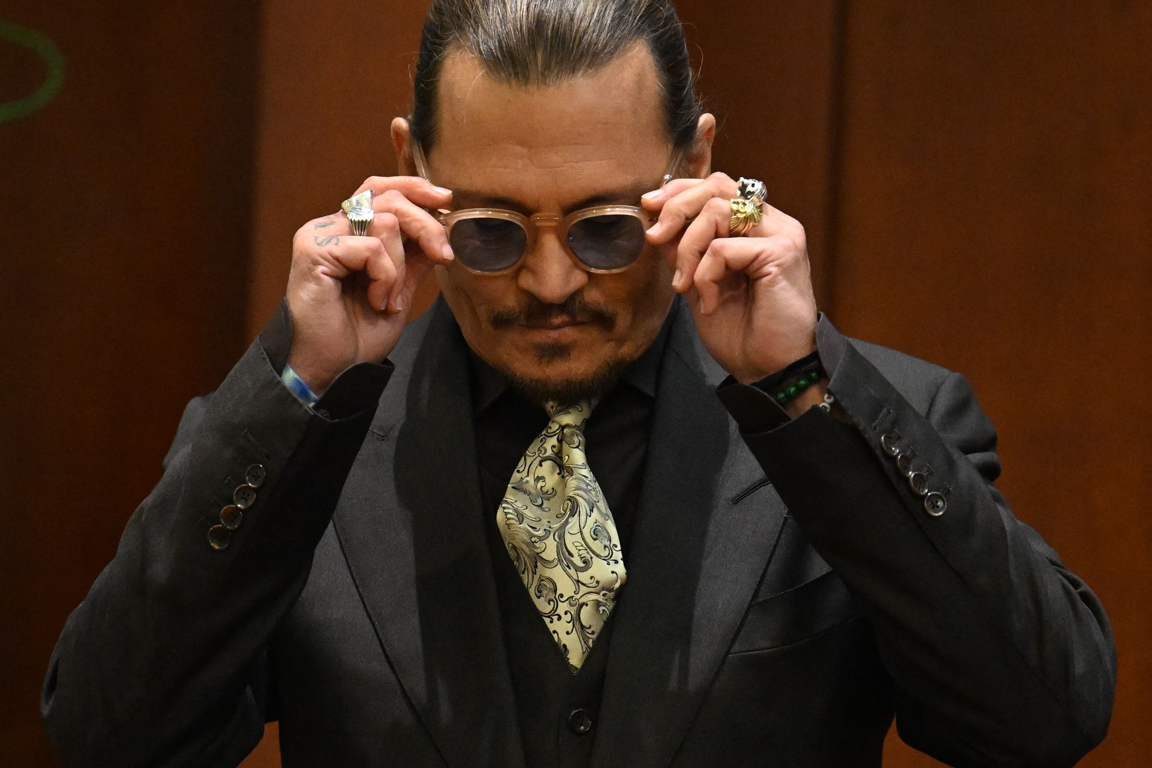 Johnny Depp testifies during his defamation trial in the Fairfax County Circuit Courthouse in Fairfax, Virginia,