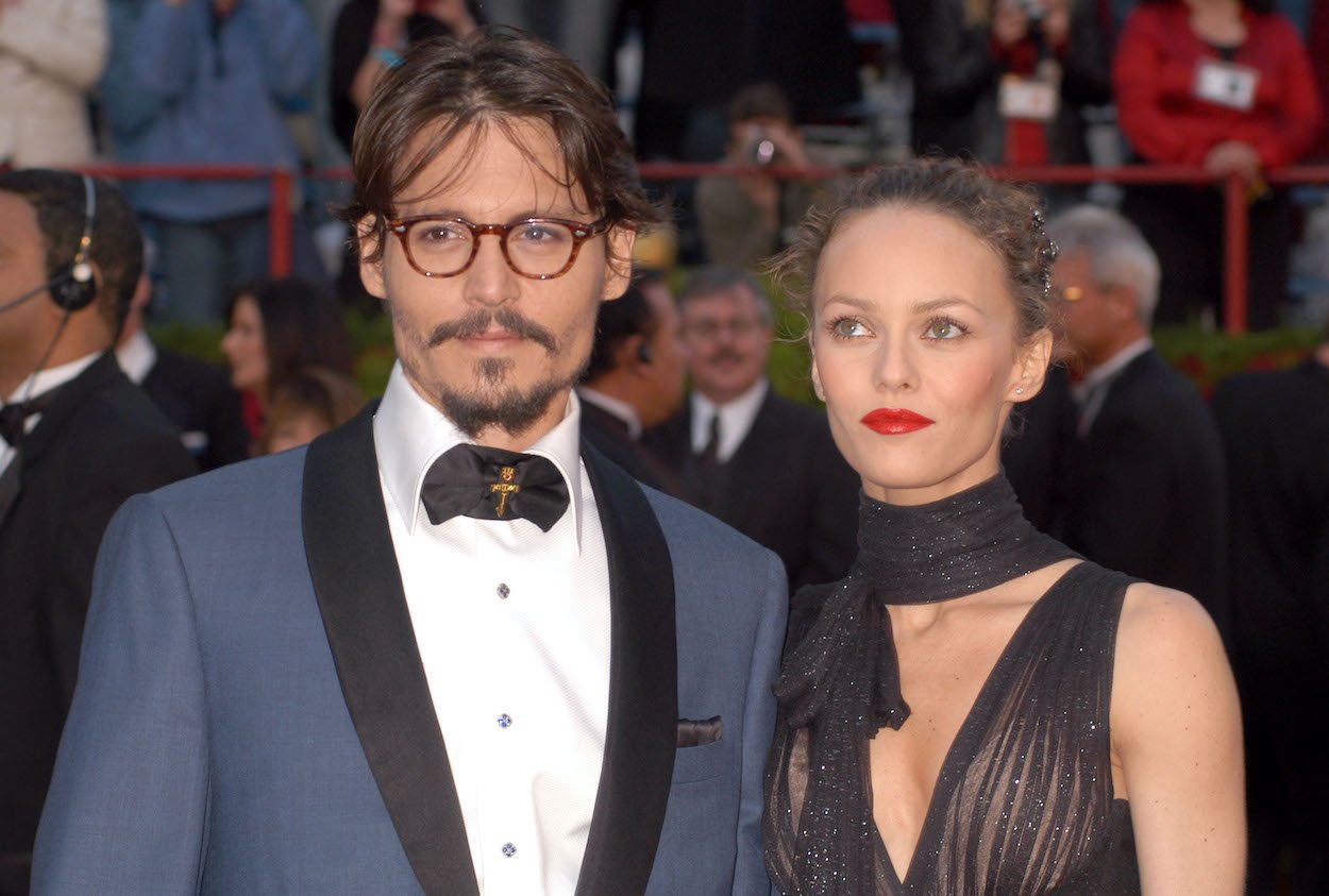 Johnny Depp (left) and Vanessa Paradis arrive at the 2005 Academy Awards. Paradis and Depp had a solid relationship, which is the opposite of Amber Heard's claims vs. Depp.