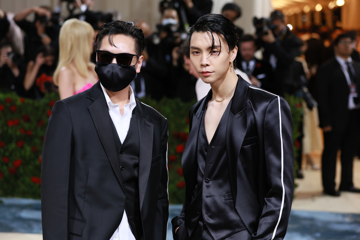 K-pop idol Johnny Suh poses on the red carpet at the Met Gala with designer Peter Do.