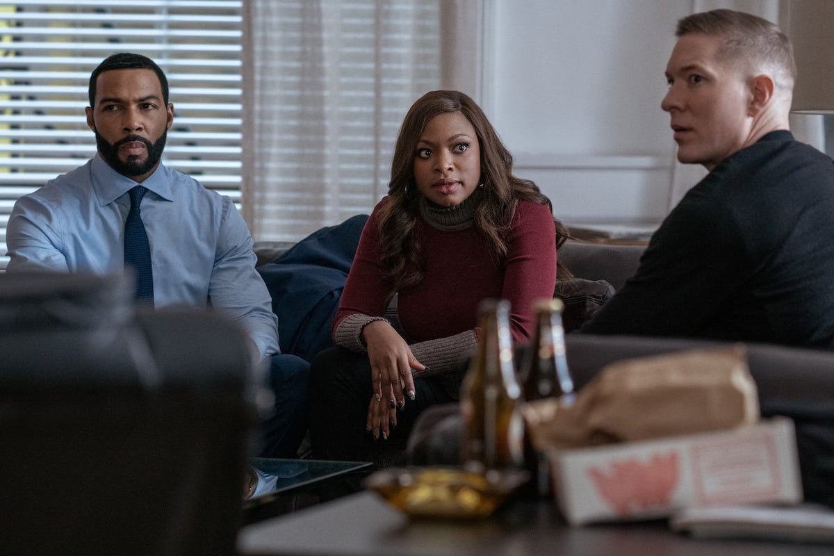 Joseph Sikora, Naturi Naughton, and Omari Hardwick pose together in a scene from 'Power' with surprised looks on their faces