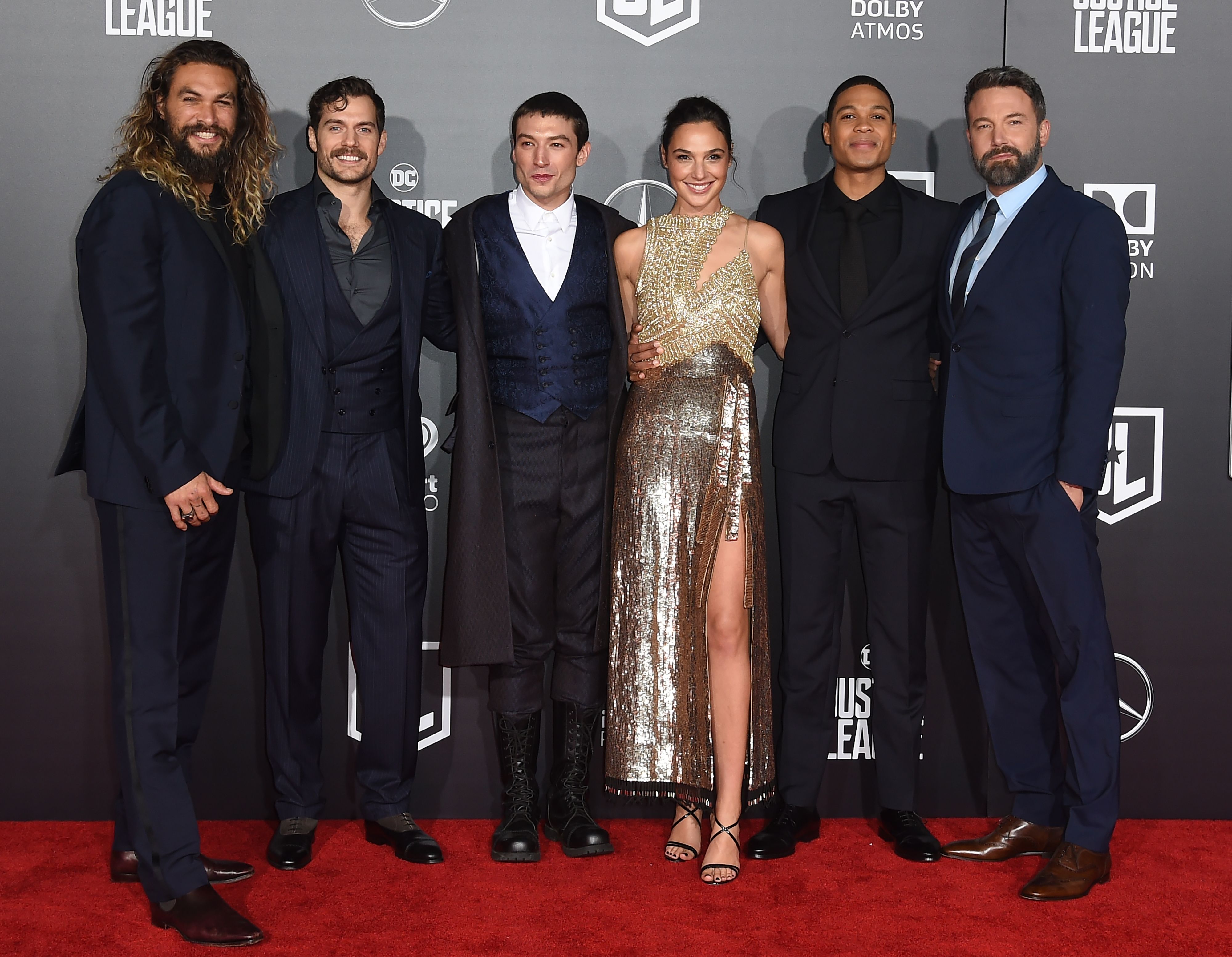 Jason Momoa, Henry Cavill, Ezra Miller, Gal Gadot, Ray Fisher, and Ben Affleck, who star in the comic book movie 'Justice League,' pose for pictures on the red carpet for the premiere.
