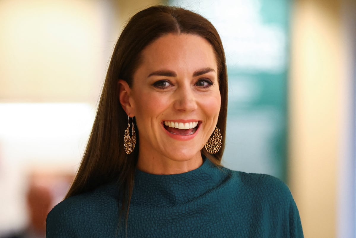 Kate Middleton, who revealed she preferred labor to pregnancy, smiles and looks on