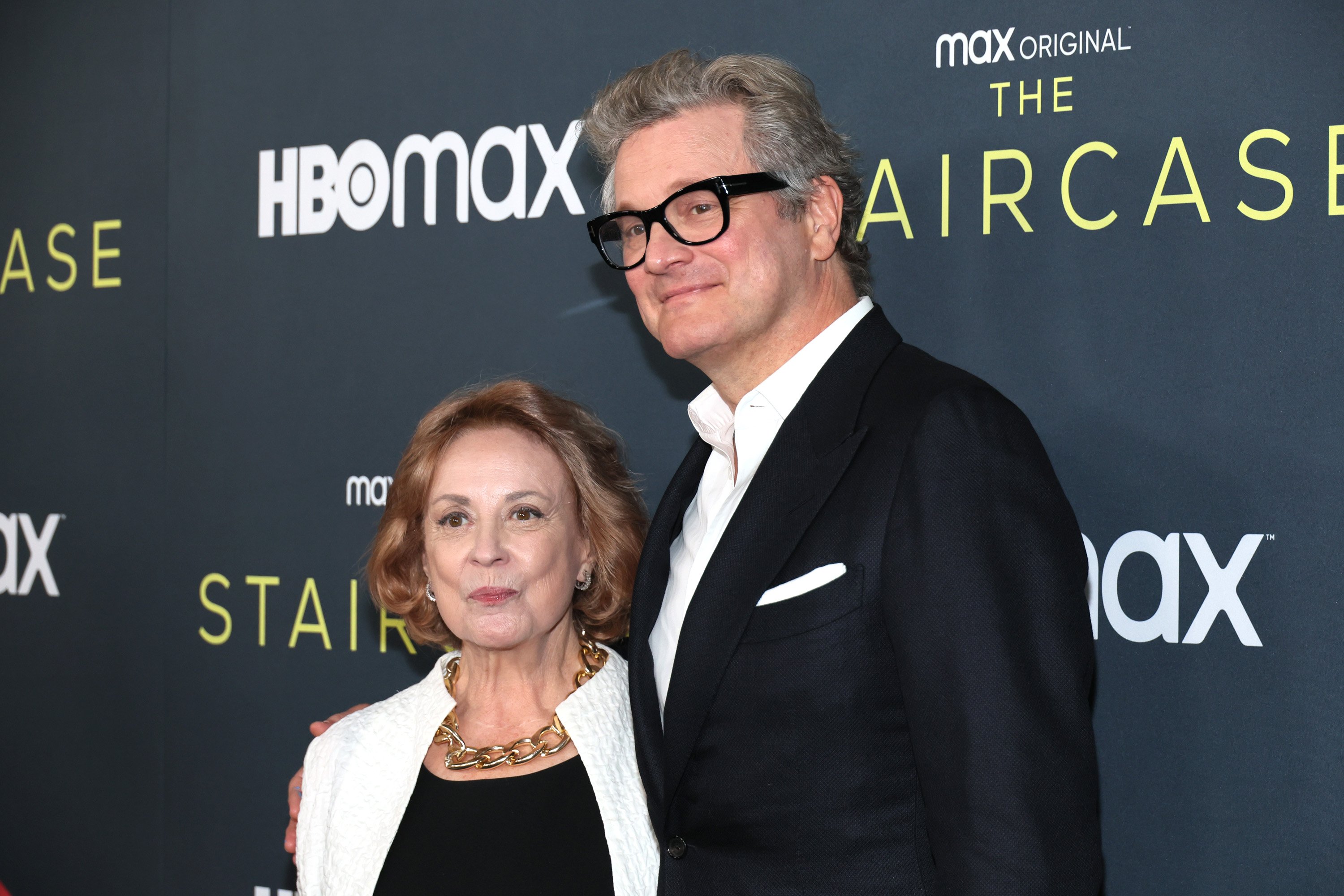 Kate Sanford and Colin Firth standing next to each other and smiling at HBO Max's "The Staircase" premiere