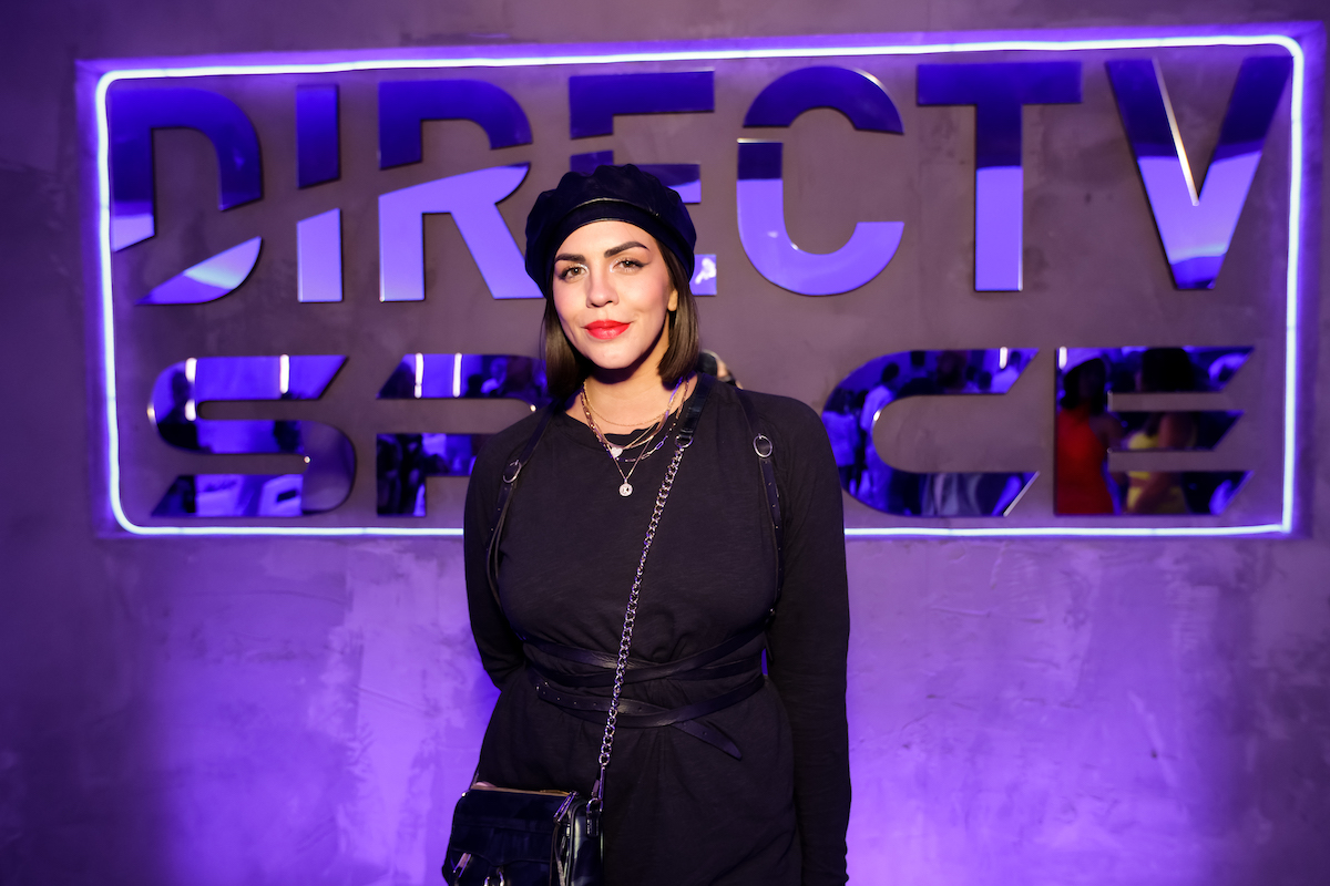 Katie Maloney poses for photos at the DIRECTV SPACE at Neon Carnival