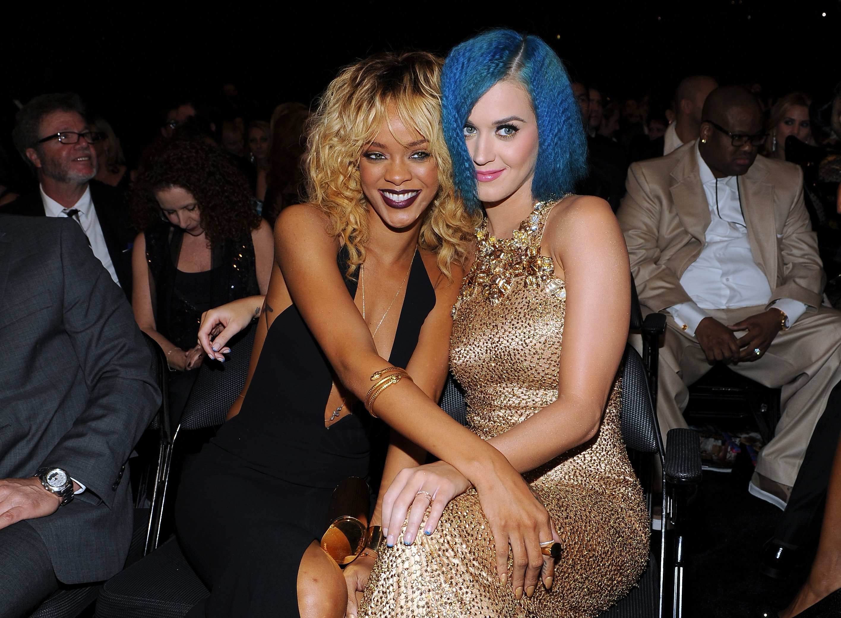 Rihanna and Katy Perry sitting next to each other