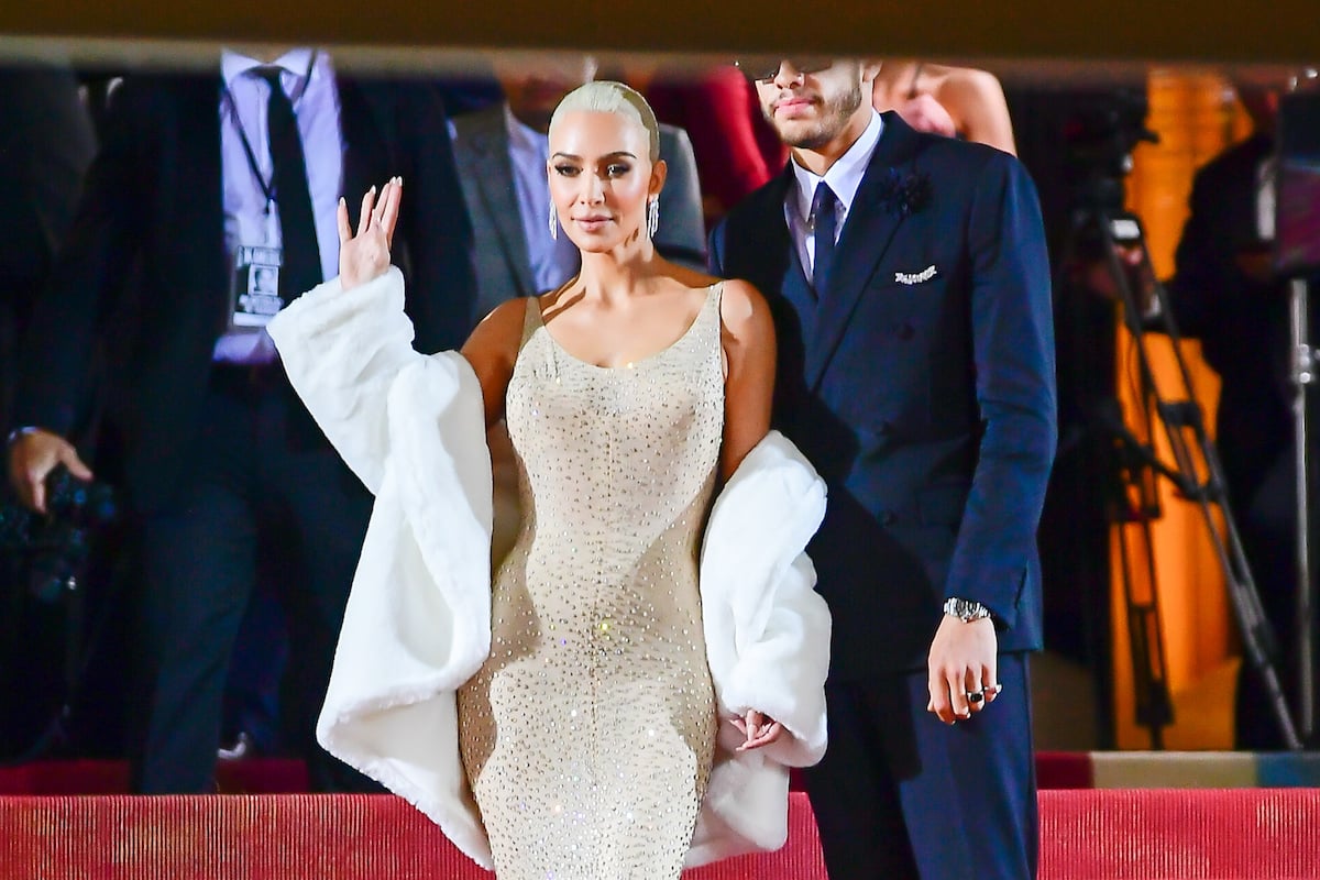 Dating couple Kim Kardashian and Pete Davidson wave to fans at the 2022 Met Gala