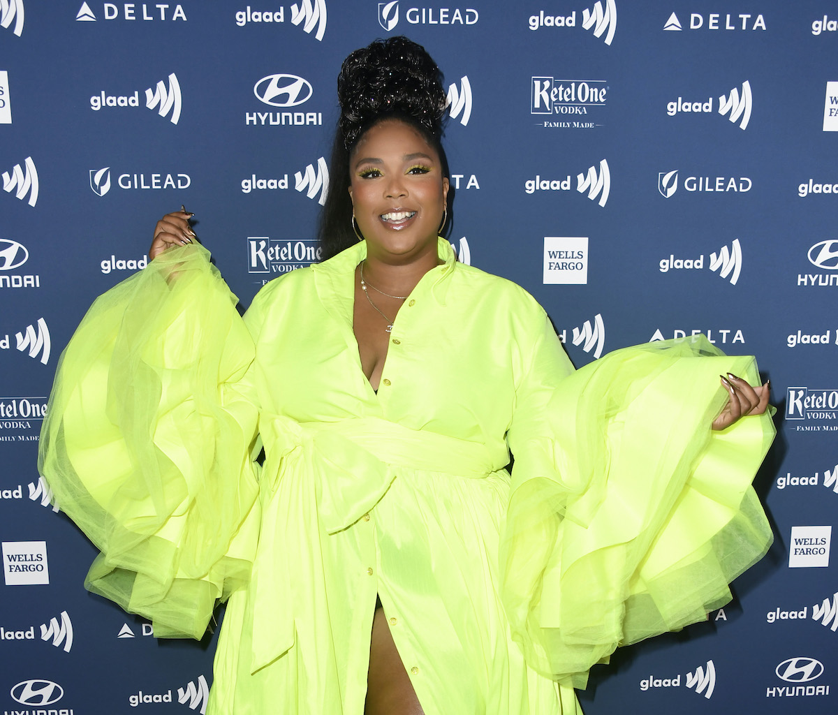 Lizzo wearing lime green