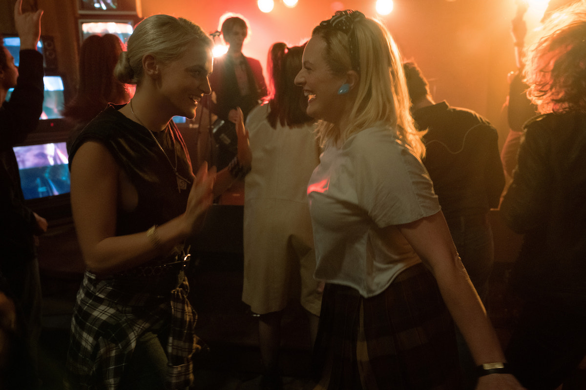 Madeline Brewer and Elisabeth Moss dance in 'Shining Girls' Season 1 Episode 6: 'Bright'