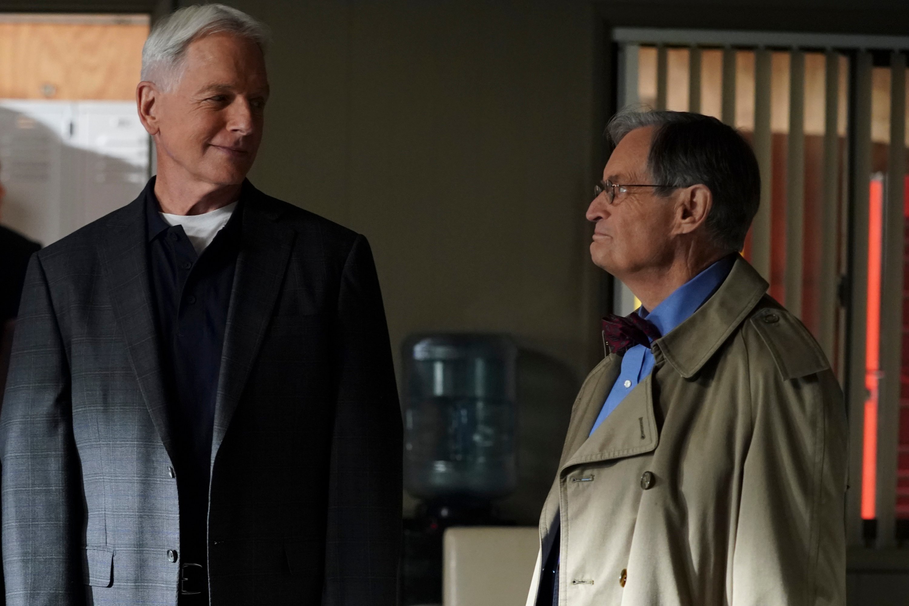 Mark Harmon and David McCallum stand next to each other during a scene on NCIS. 