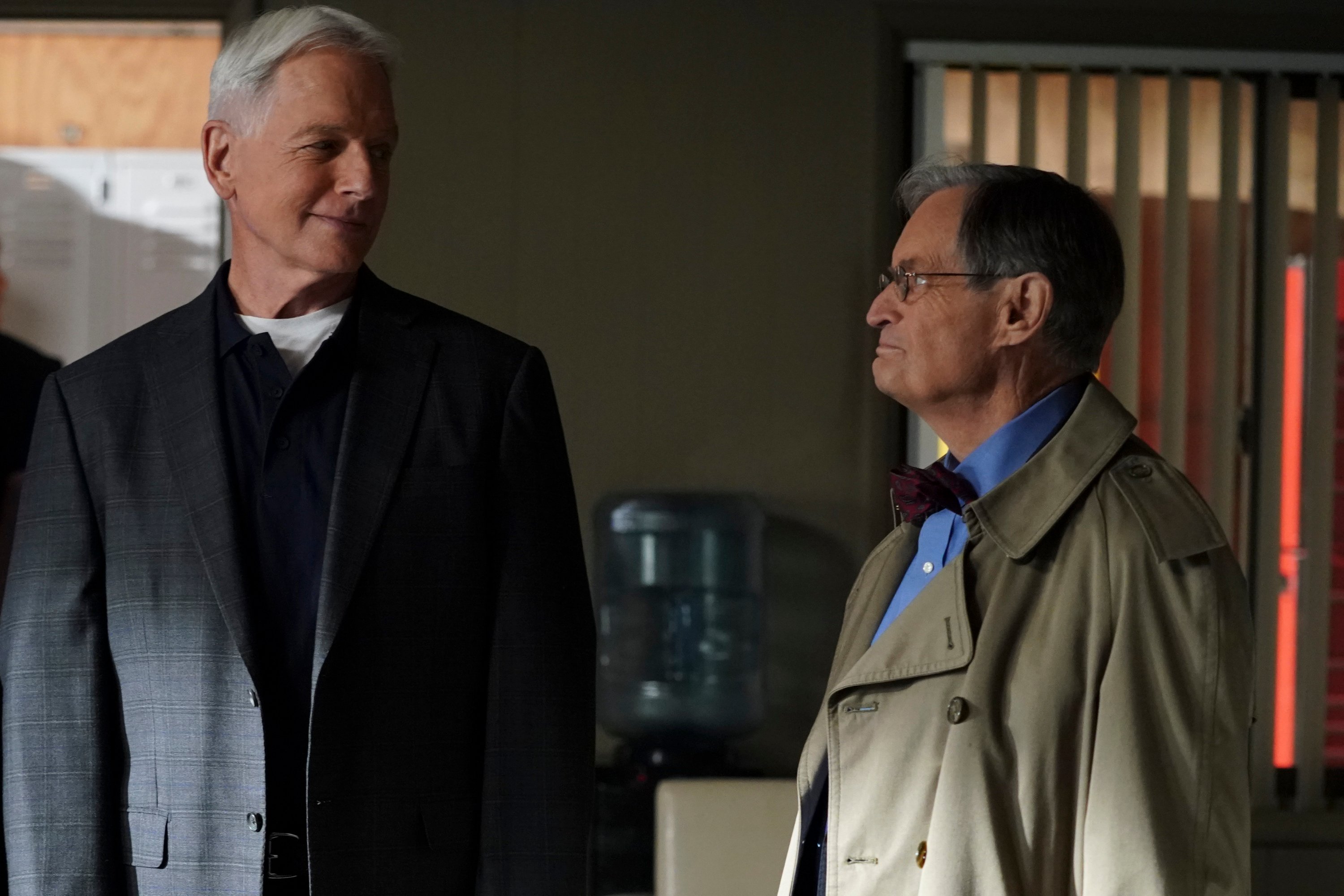 Mark Harmon and David McCallum stand next to each other during a scene on NCIS.