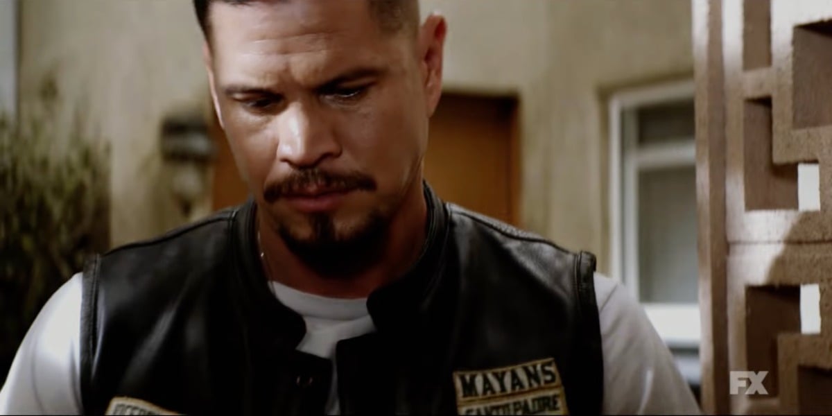 JD Pardo as EZ Reyes in Mayans MC Season 4. EZ wears his Mayans kutte and looks concerned. 