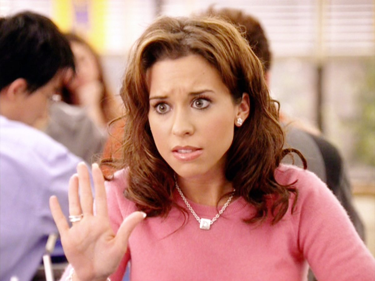 Lacey Chabert as Gretchen Wieners wearing a pink sweater