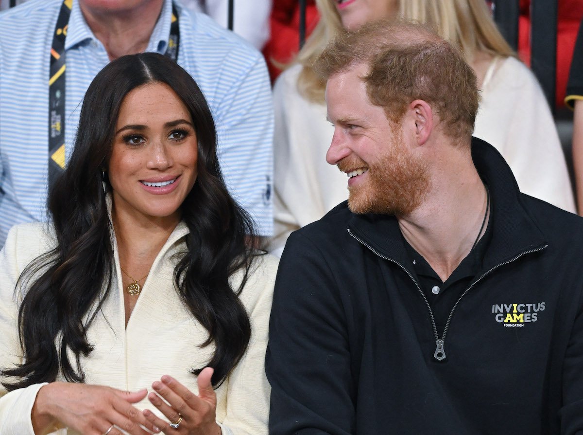 Meghan Markle, who asked one question after meeting Prince Harry, sits next to Prince Harry