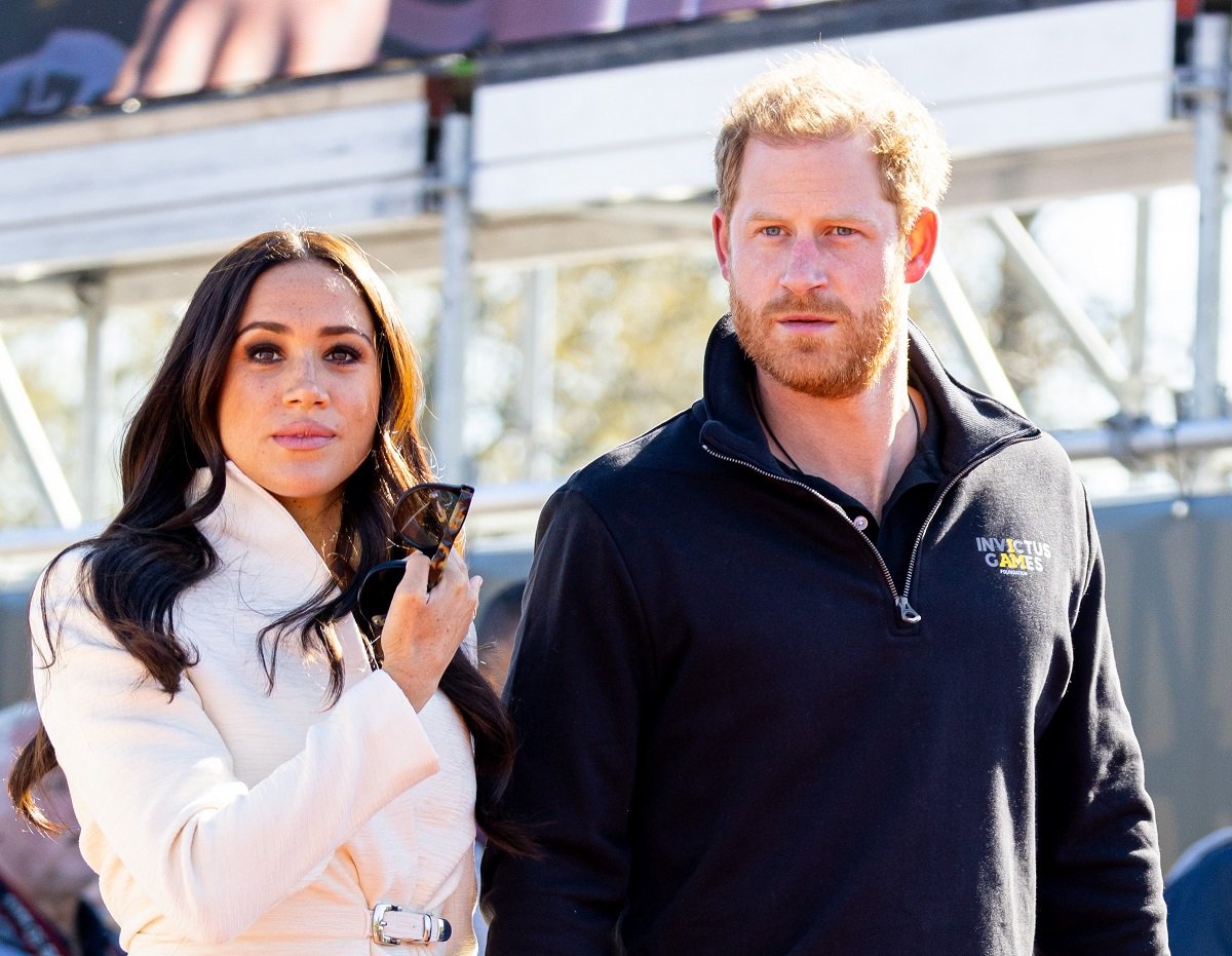 Prince Harry and Meghan Markle, who have dished out plenty of dirt on the royal family,attend day two of the Invictus Games