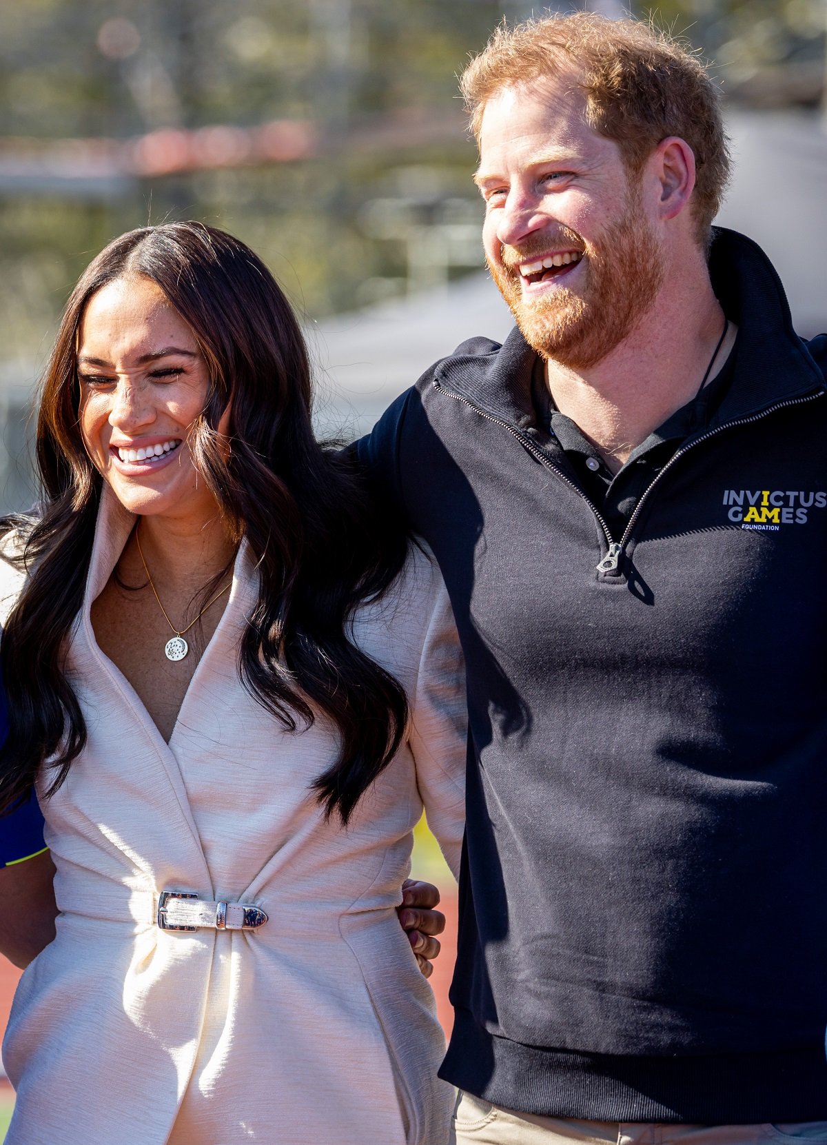 Meghan Markle and Prince Harry laughing during day two of the Invictus Games