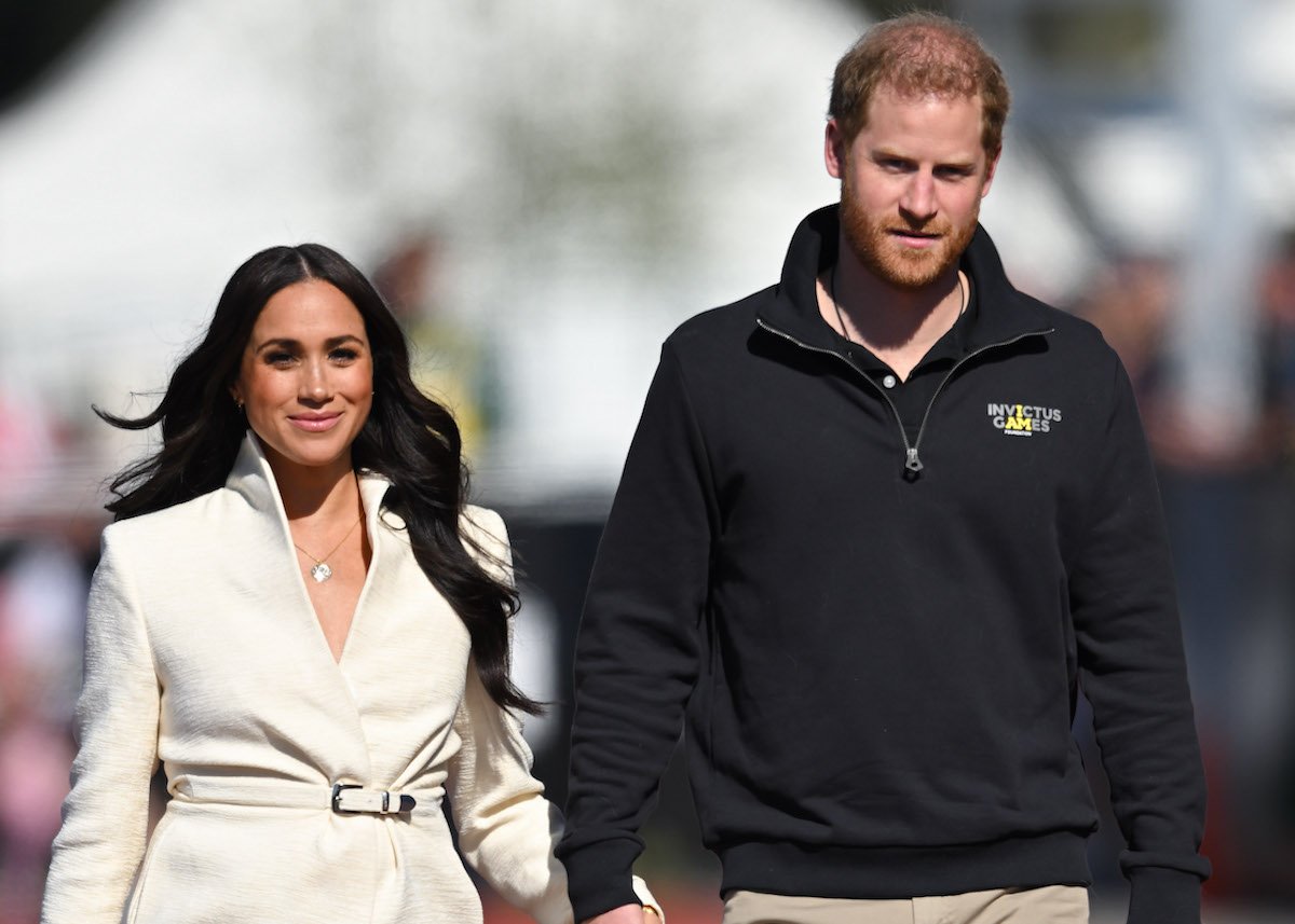 Meghan Markle and Prince Harry, who are reportedly staying with Princess Eugenie at Frogmore Cottage during a Platinum Jubilee visit, attend an Invictus Games event