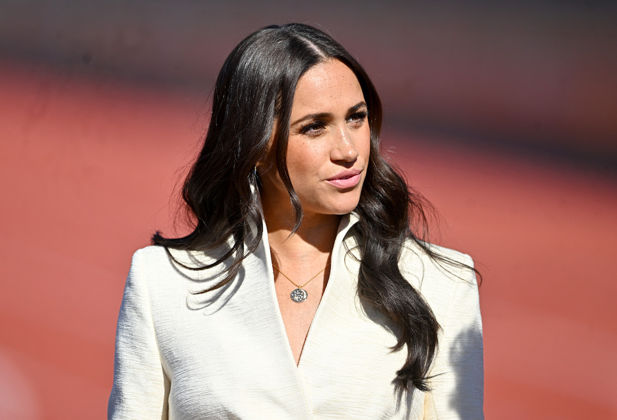 Meghan Markle, who created an 'awkward dynamic' between her,  Prince Harry, Prince William, and Kate Middleton at the Royal Foundation Forum, looks on at the Invictus Games