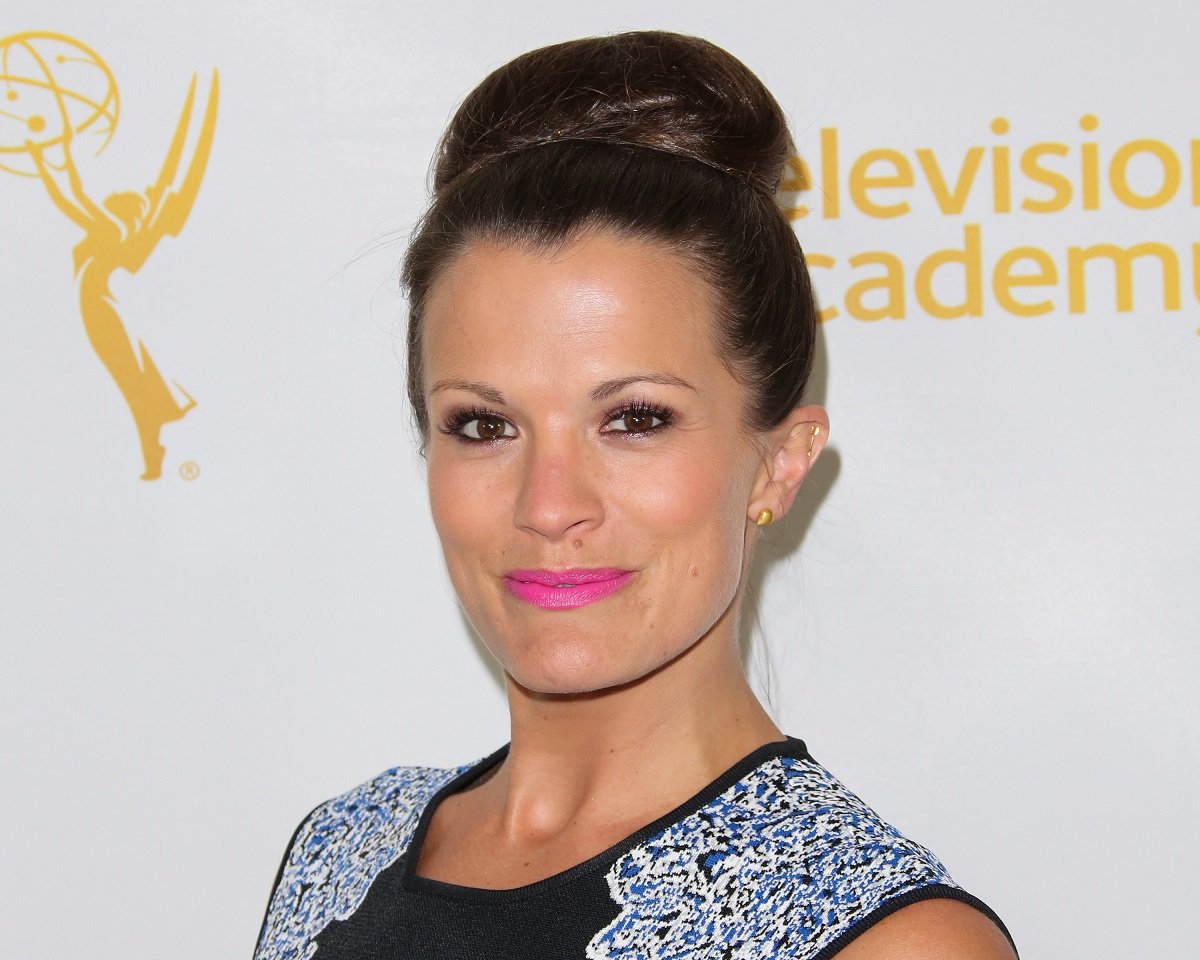 'The Young and the Restless' star Melissa Claire Egan wearing a black, white, and blue print dress.