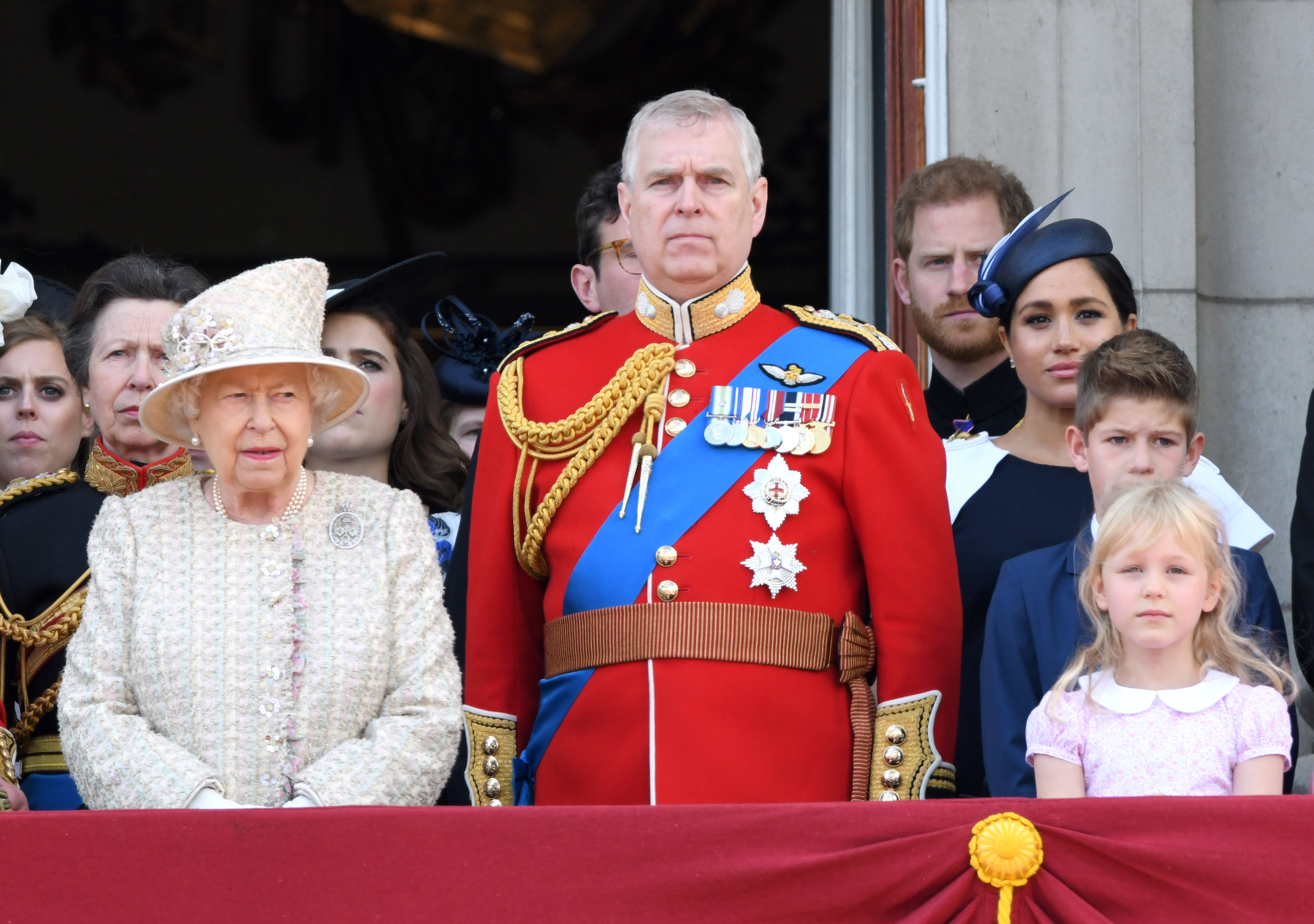 Members of the royal family including Queen Elizabeth II, Prince Andrew, Prince Harry and Meghan Markle on the balcony during Trooping The Colour