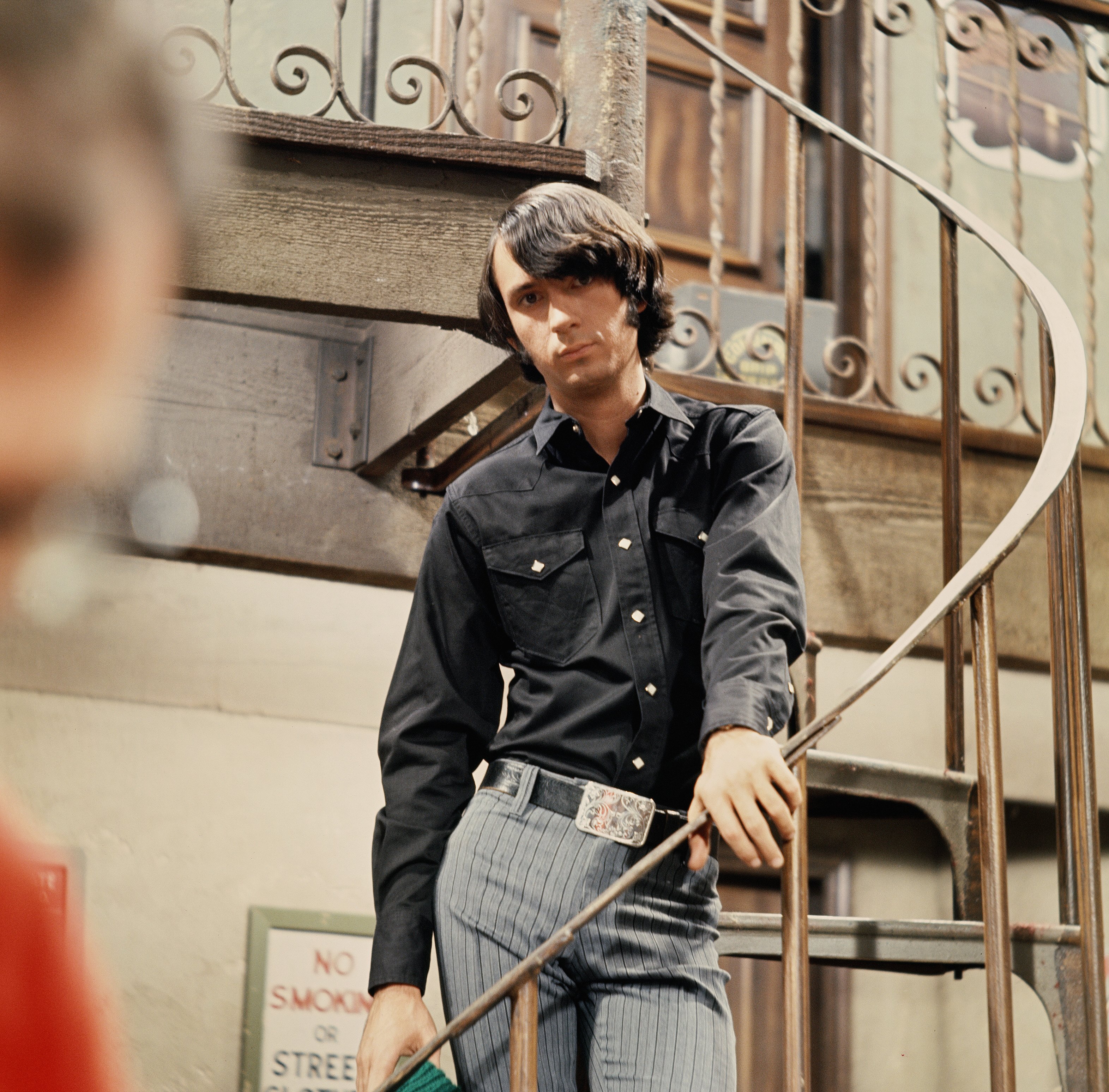 The Monkees' Mike Nesmith on stairs