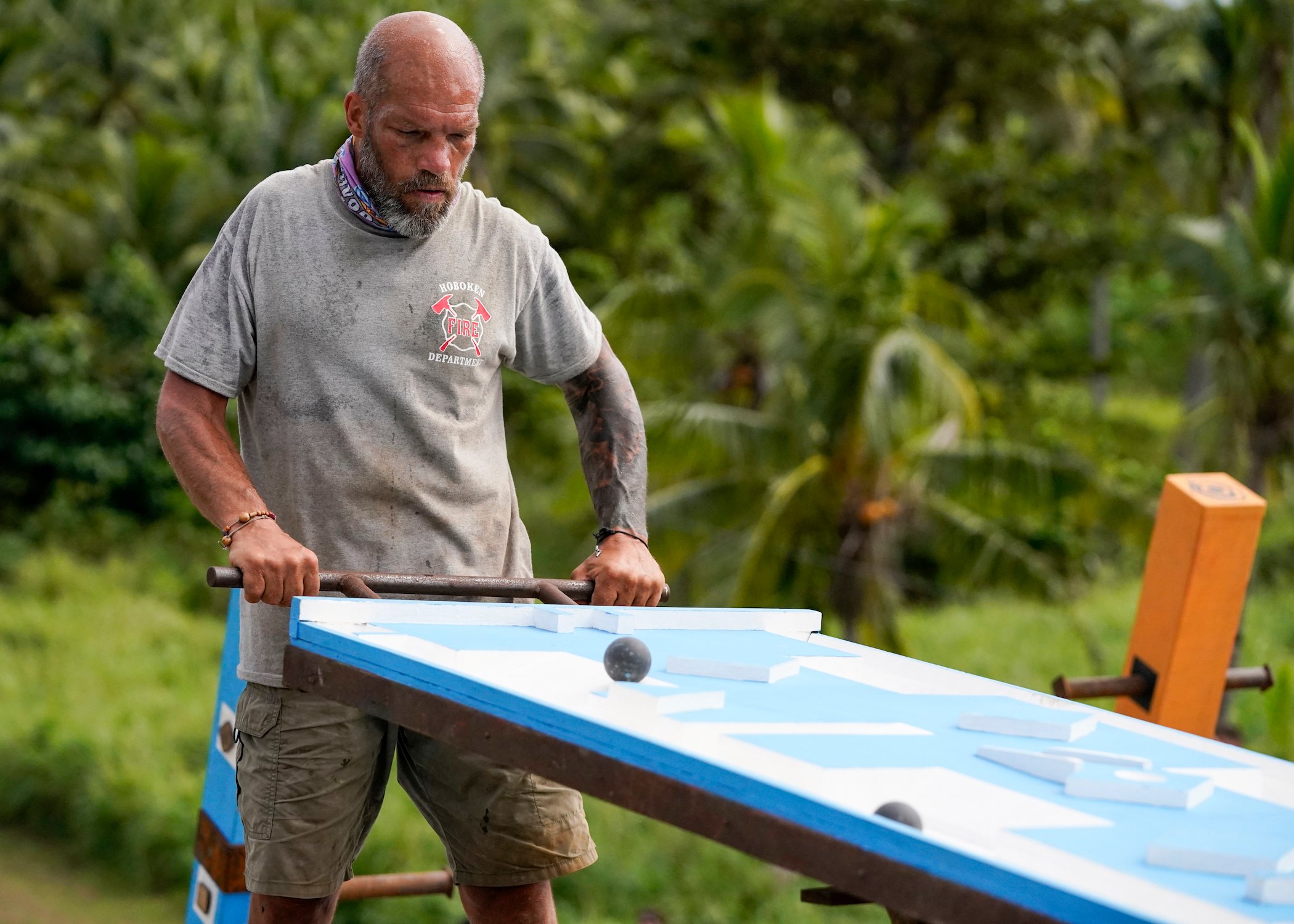 Mike Turner competing in a challenge in 'Survivor' Season 42
